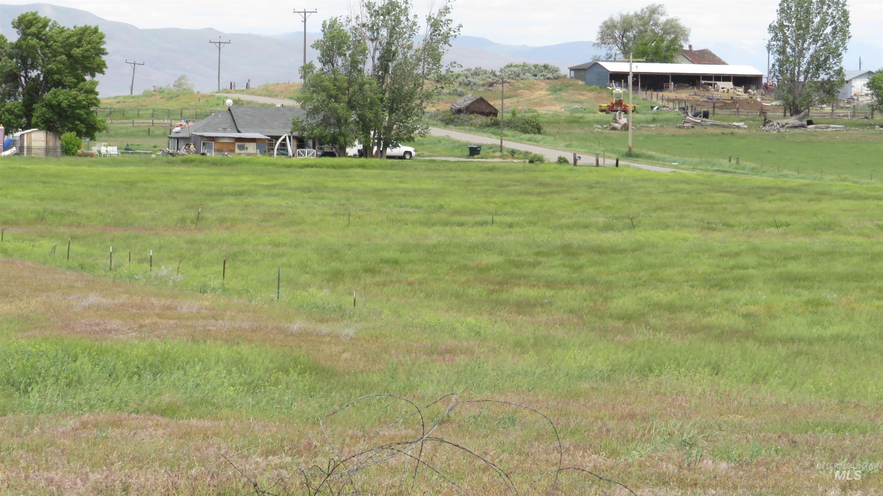 View of yard with a view of countryside and a mountain view
