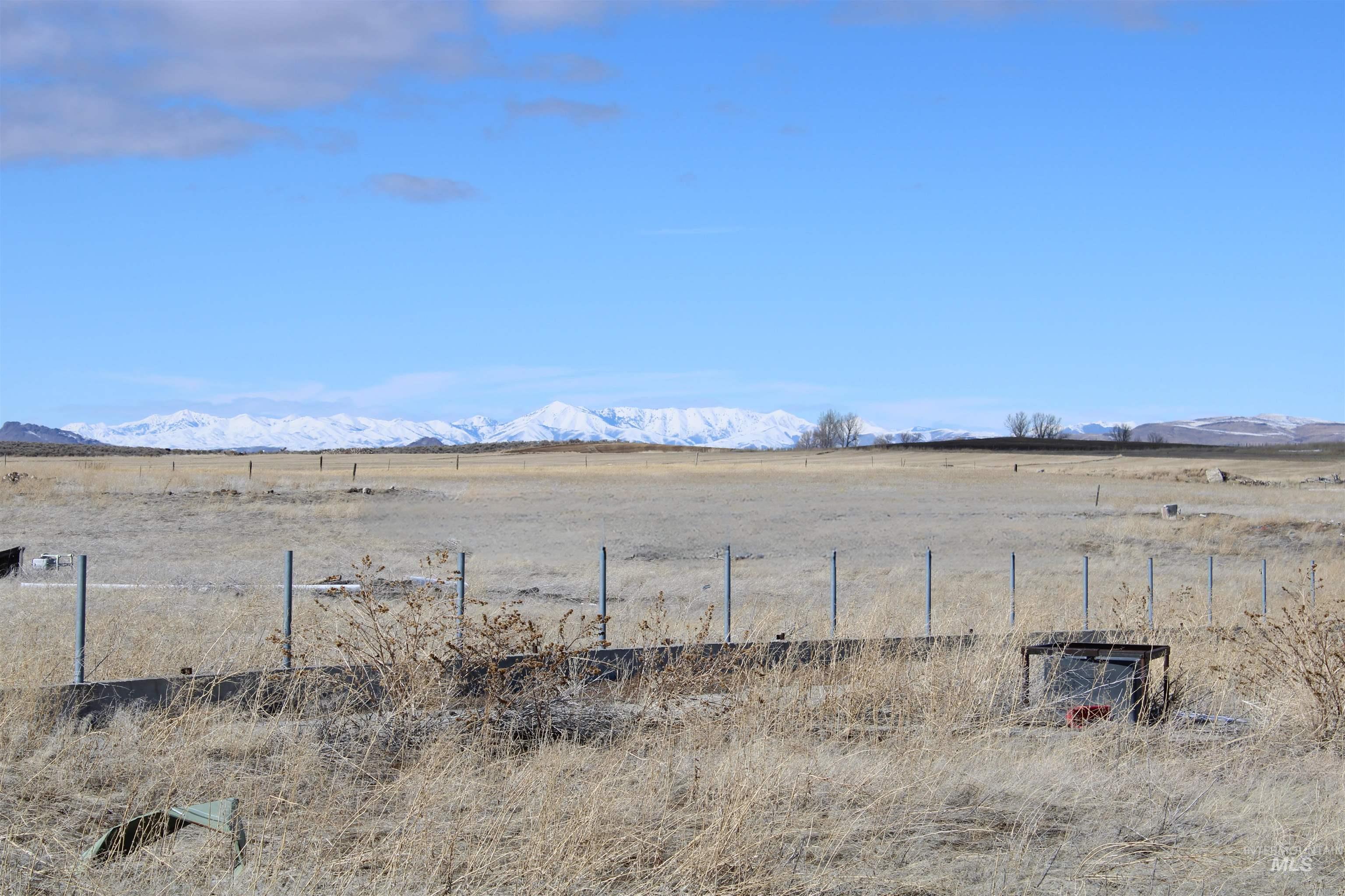 View of yard with a view of rural / pastoral area and a mountain view
