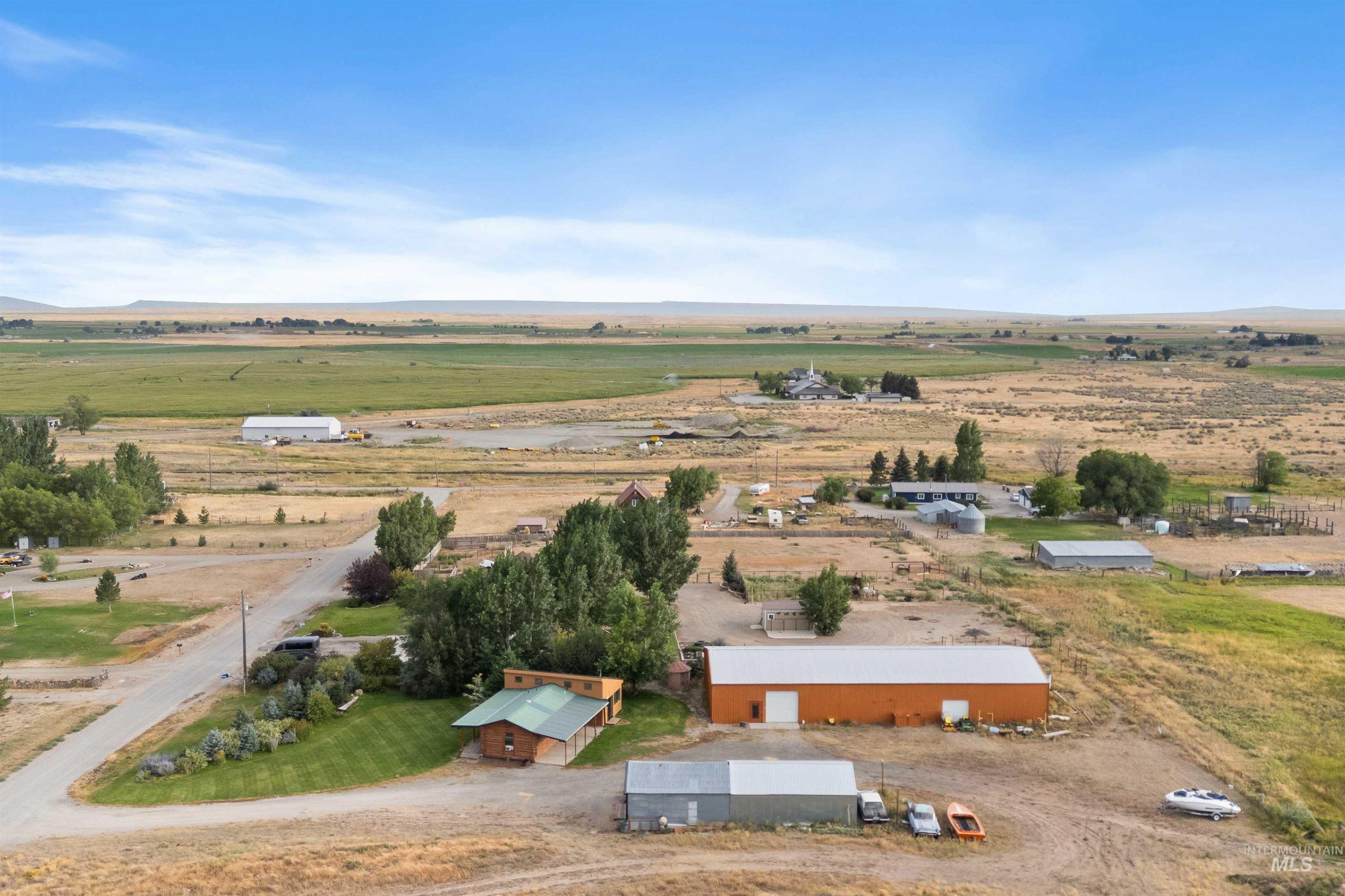 Aerial view of sparsely populated area featuring a mountainous background