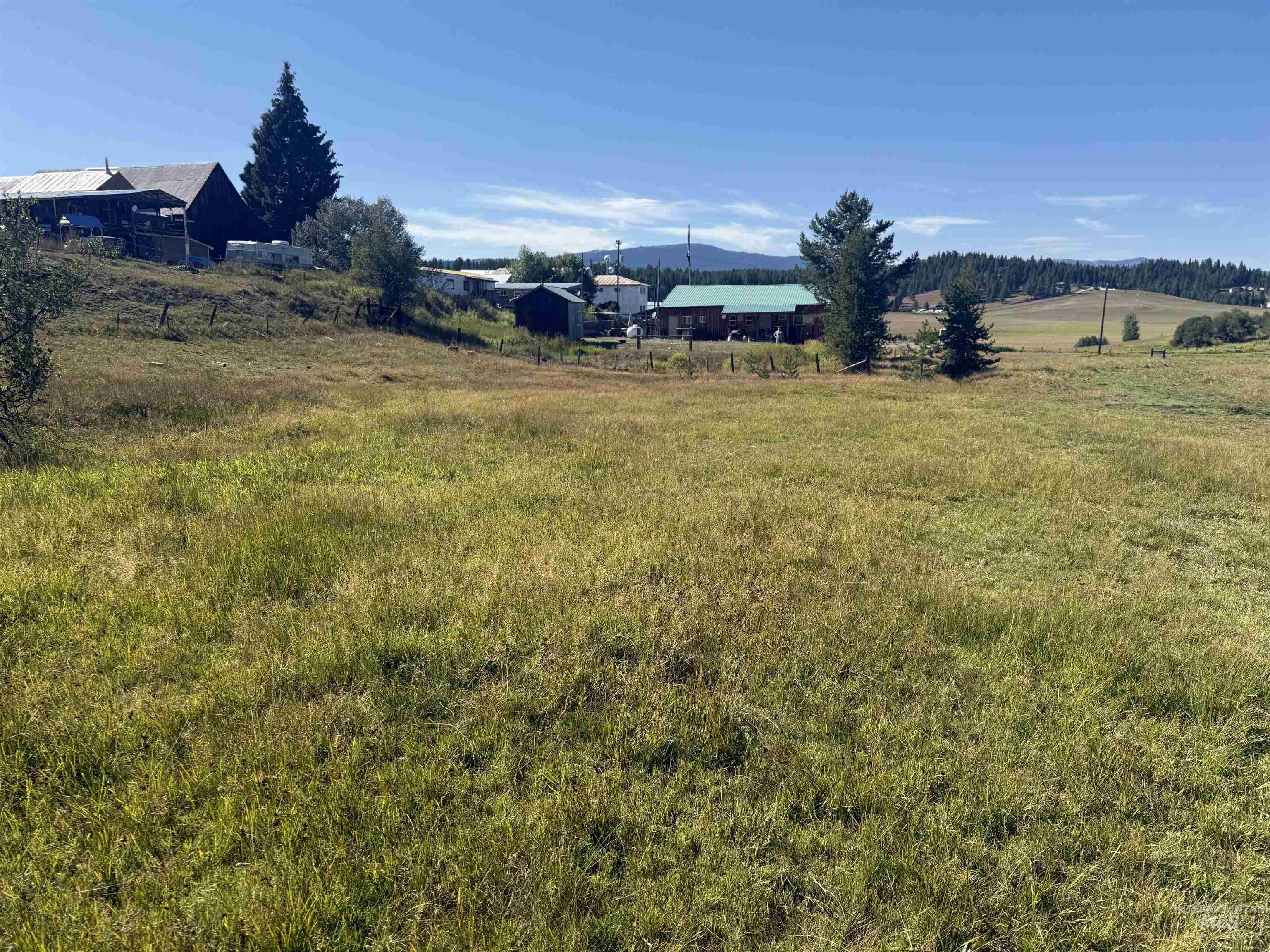 View of yard featuring a view of countryside and a mountain view