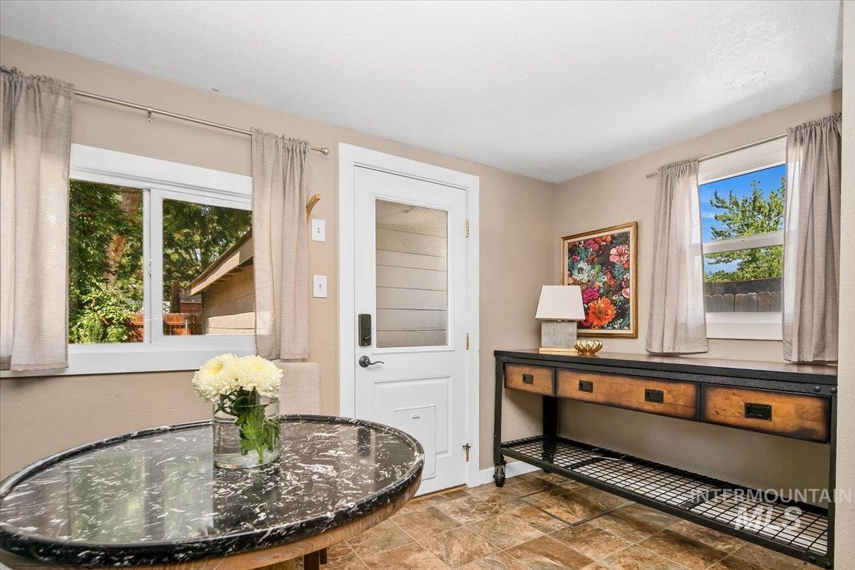 Doorway with stone finish floors