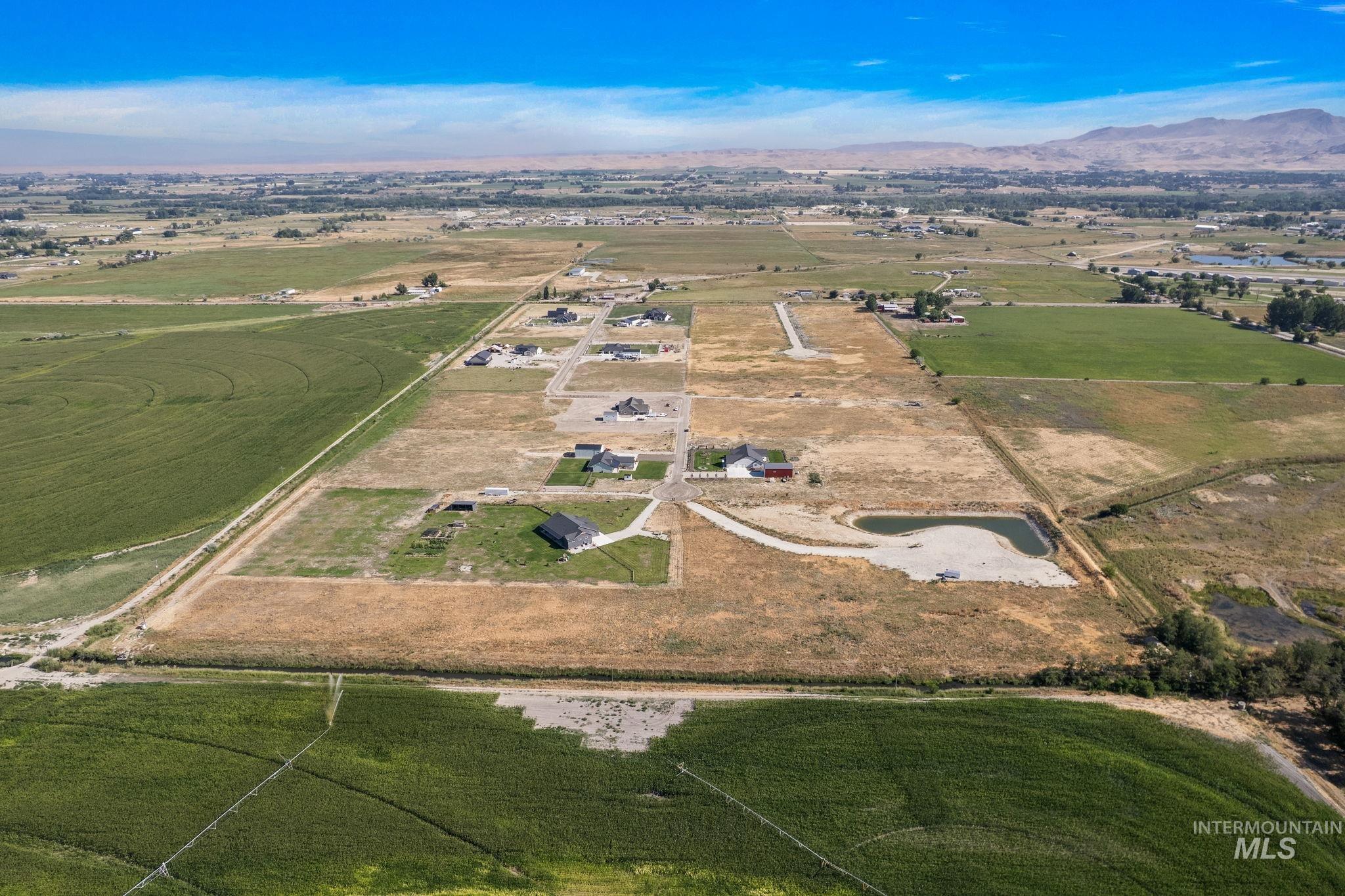 View of property location featuring rural landscape and a mountain backdrop