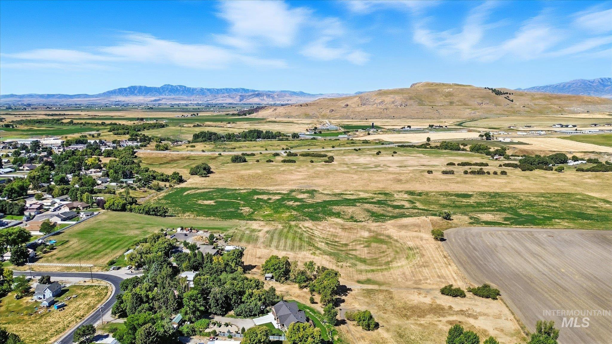 Overview of rural landscape featuring mountains