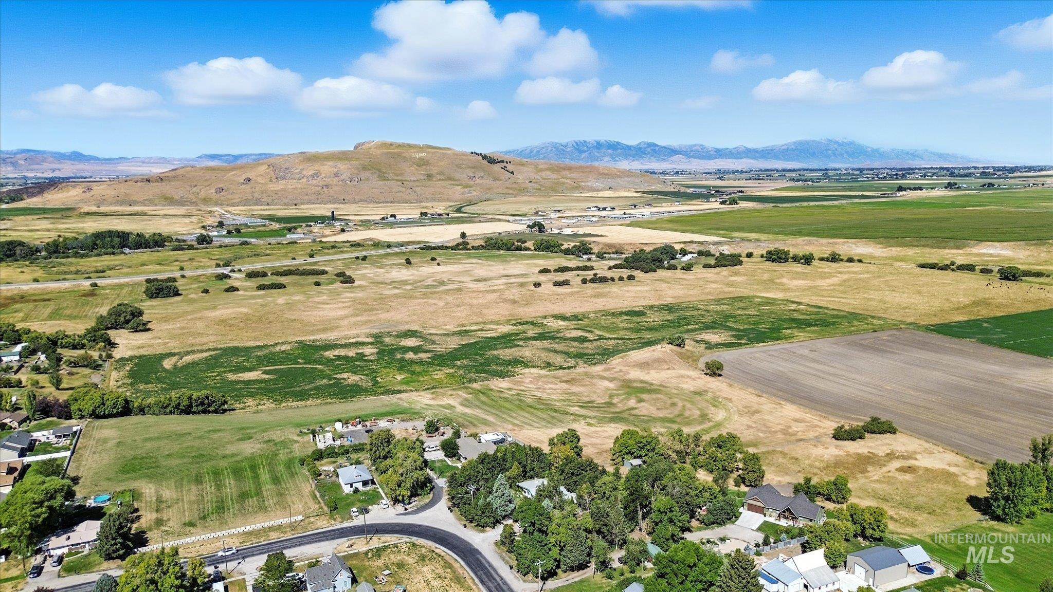 View of rural area with a mountain backdrop