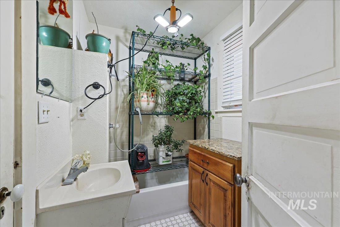 Bathroom with  shower combination and vanity