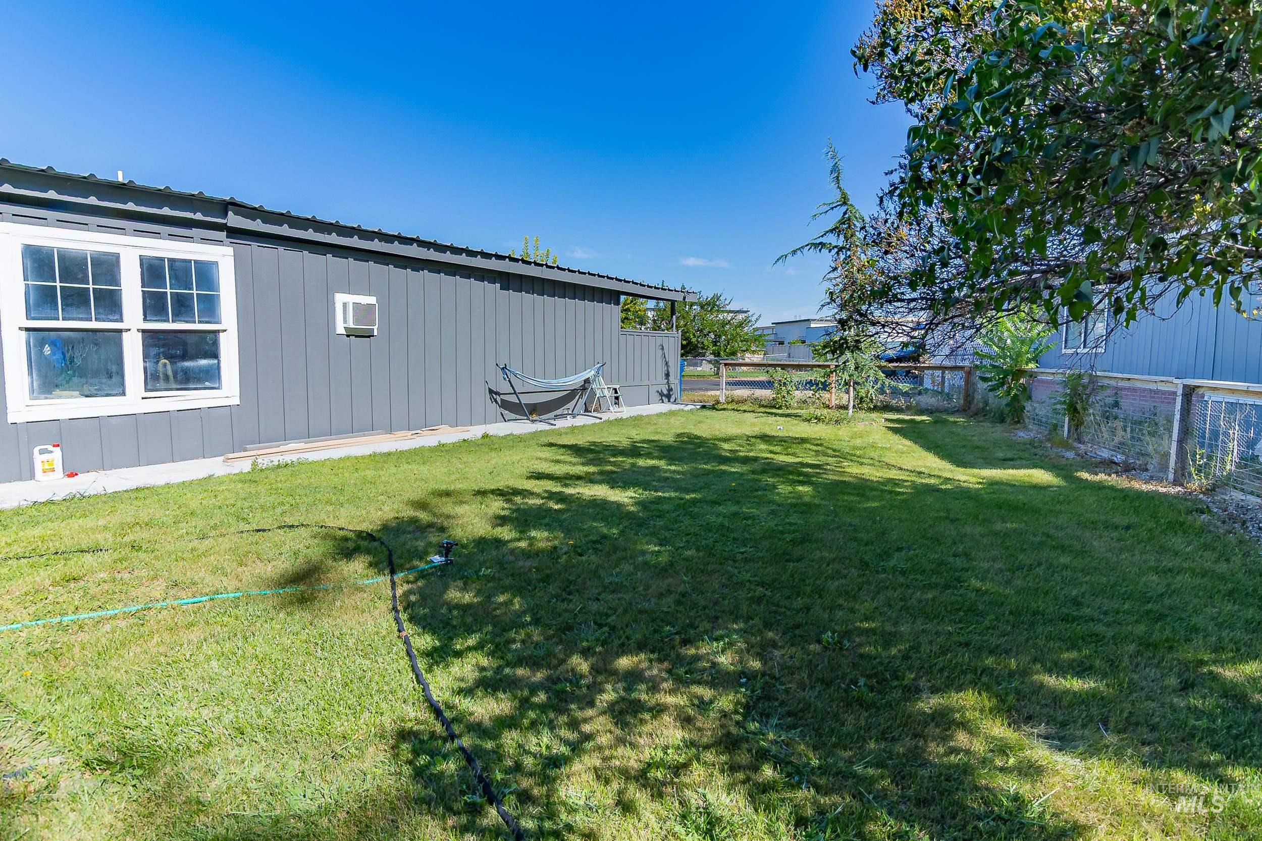 View of fenced backyard
