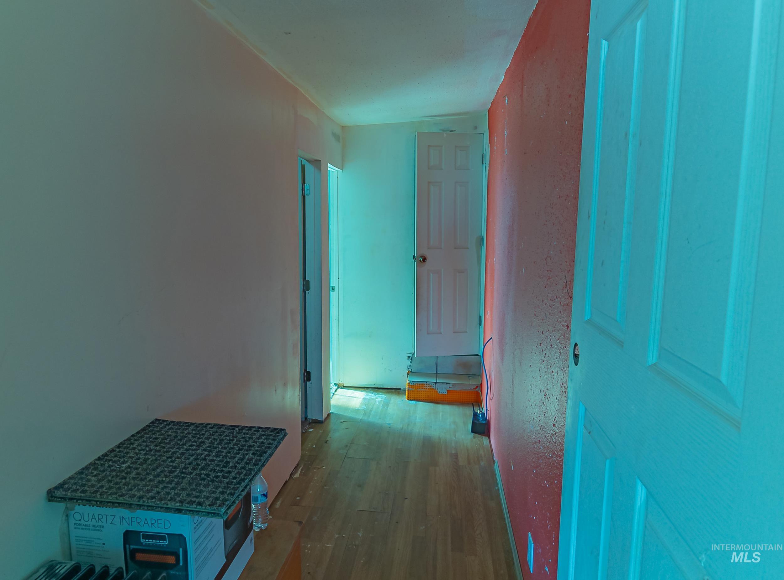 Hall with wood finished floors