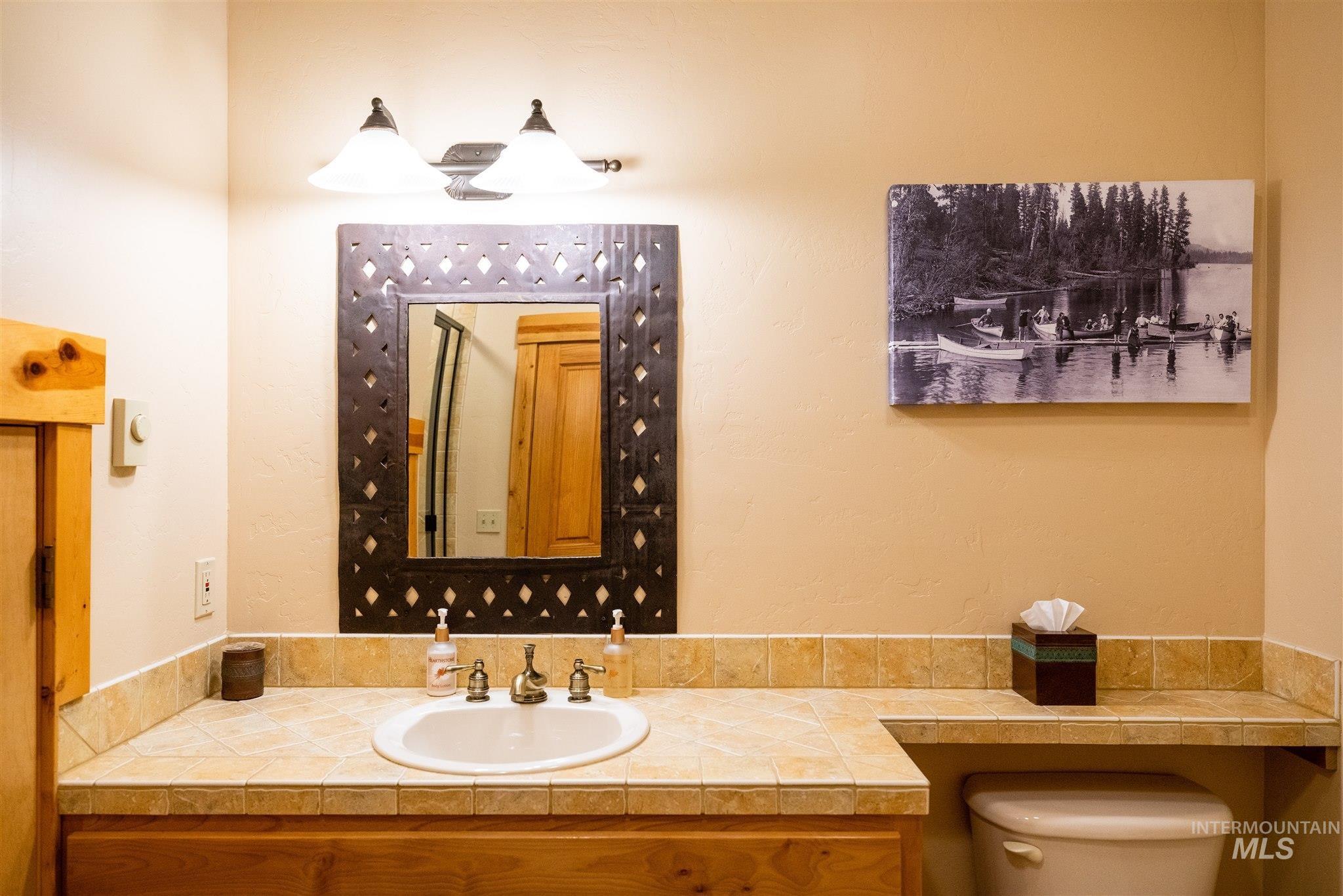 Bathroom with vanity and toilet