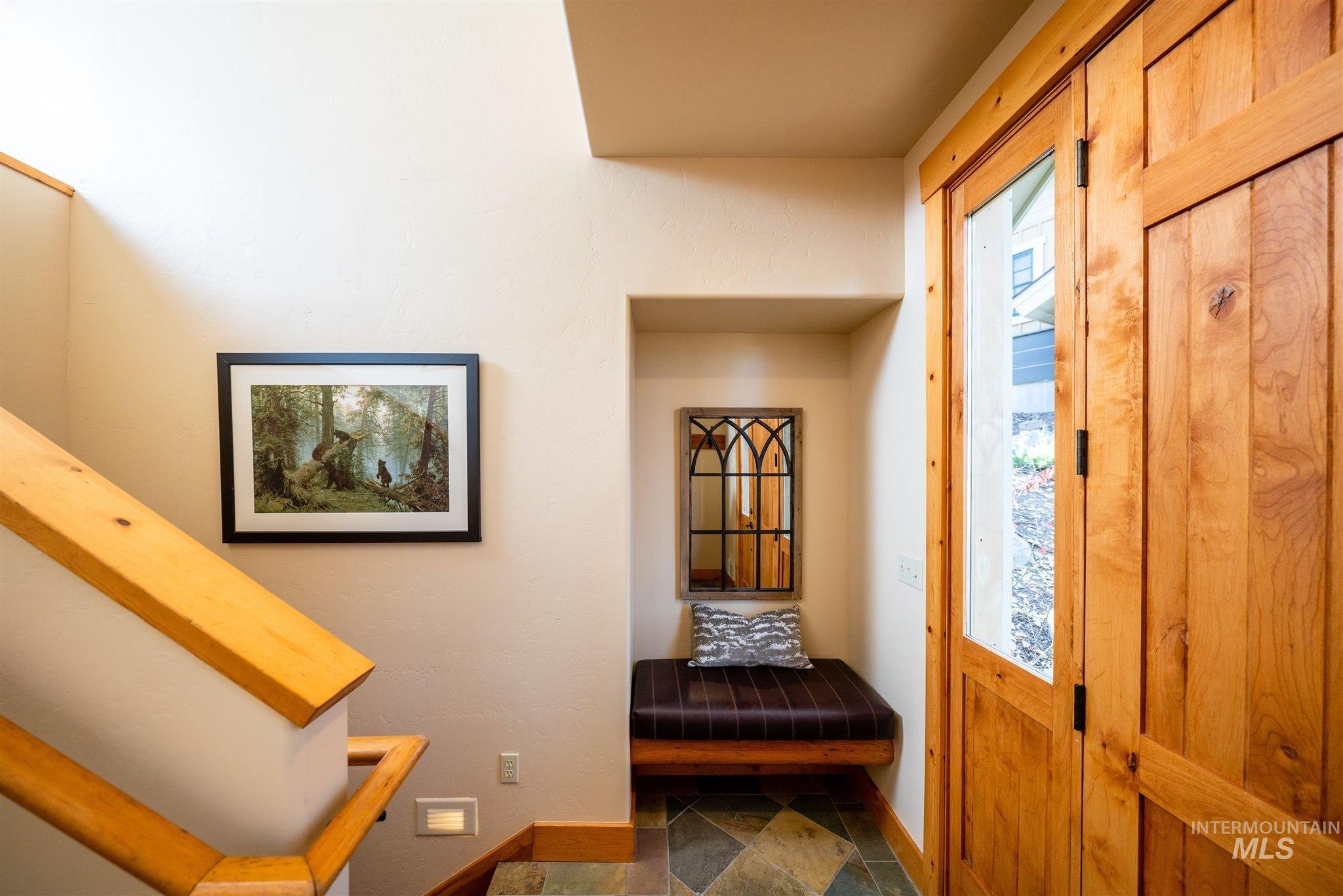 Foyer featuring baseboards