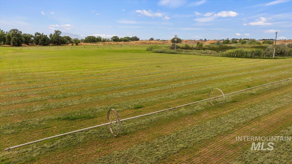 View of grassy yard with a view of countryside