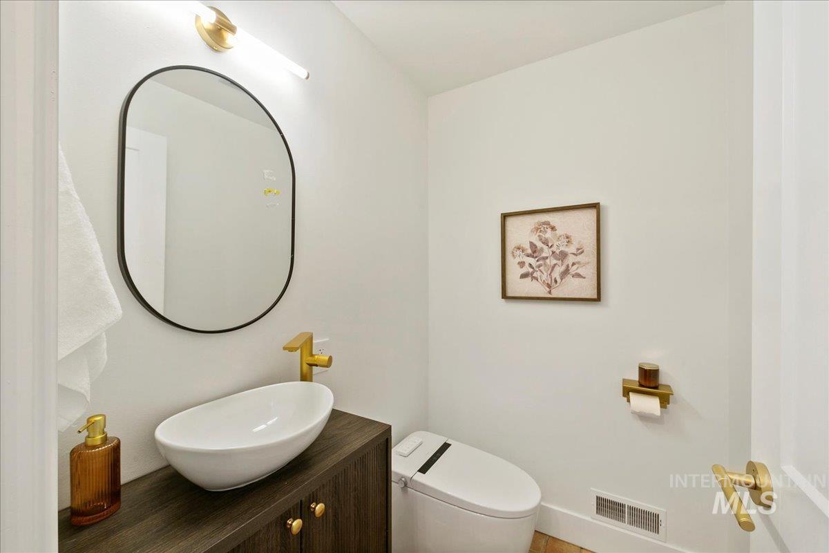 Bathroom with vanity and toilet