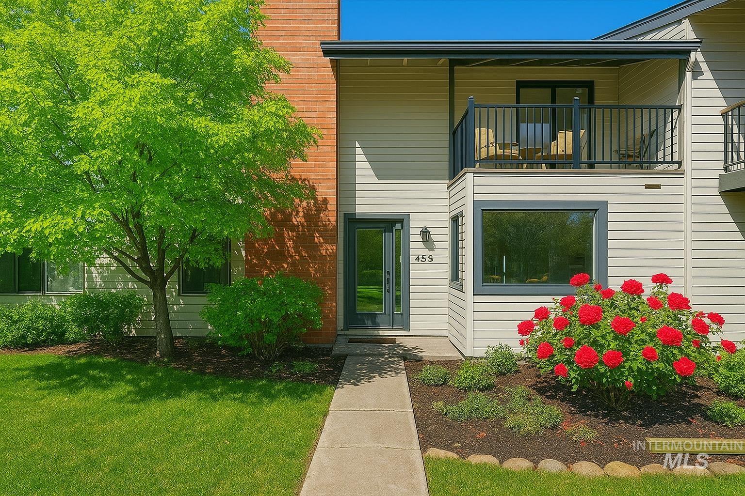 Property entrance with a lawn