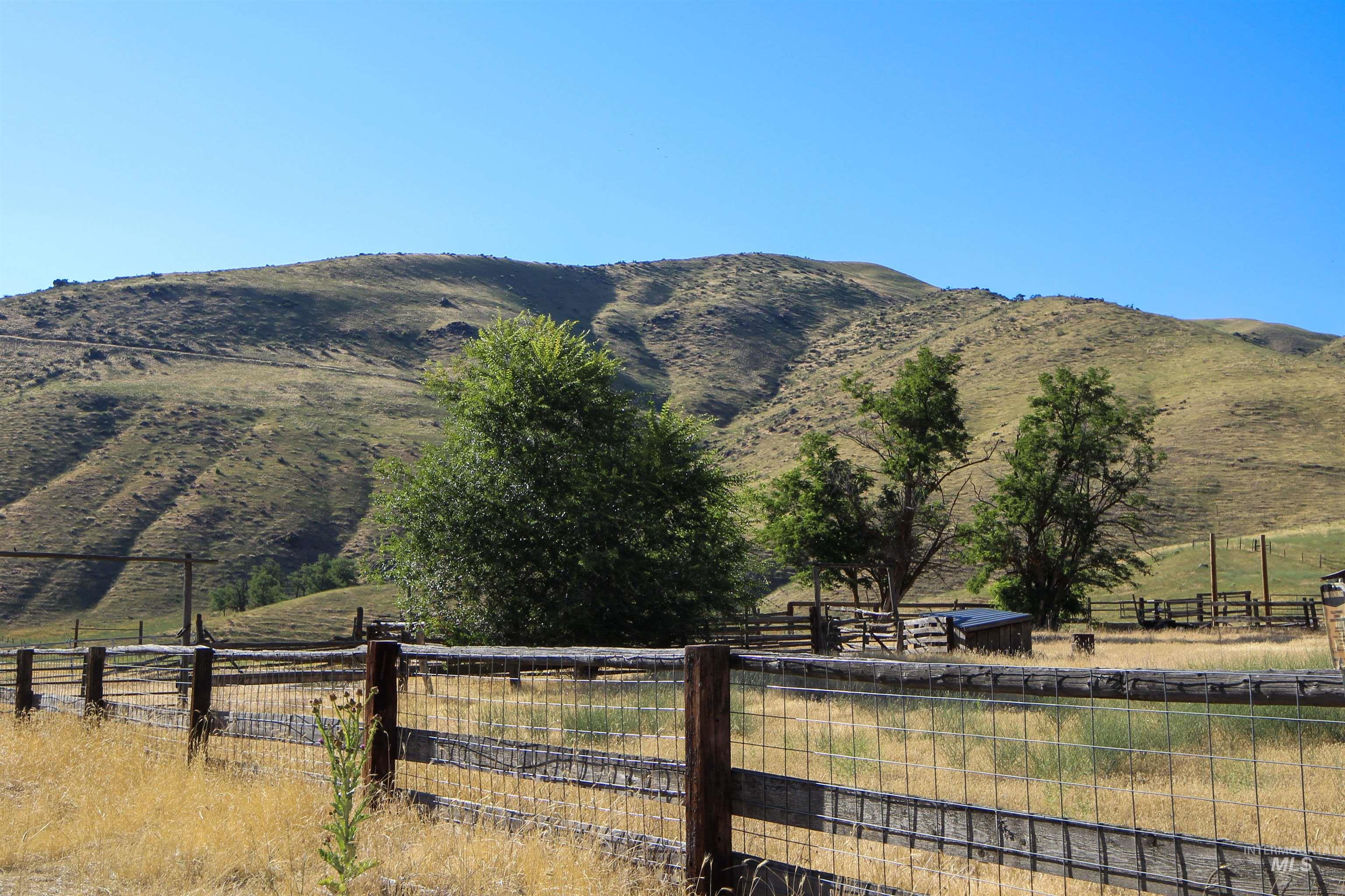 Mountain view featuring rural landscape and a pastoral area