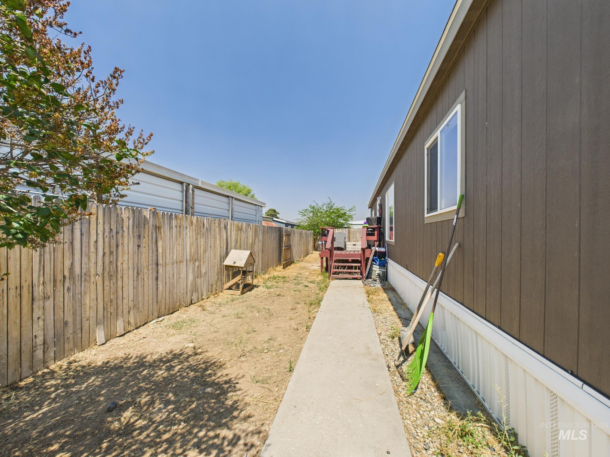 View of fenced backyard