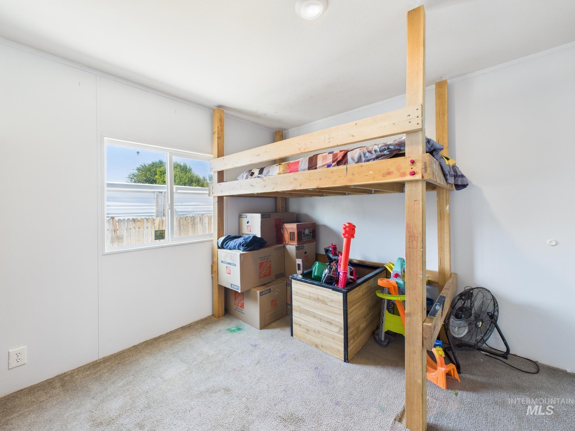 Bedroom with carpet floors