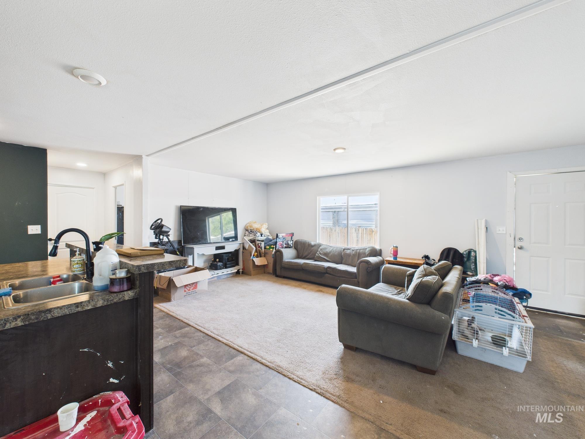 Living area with stone finish flooring
