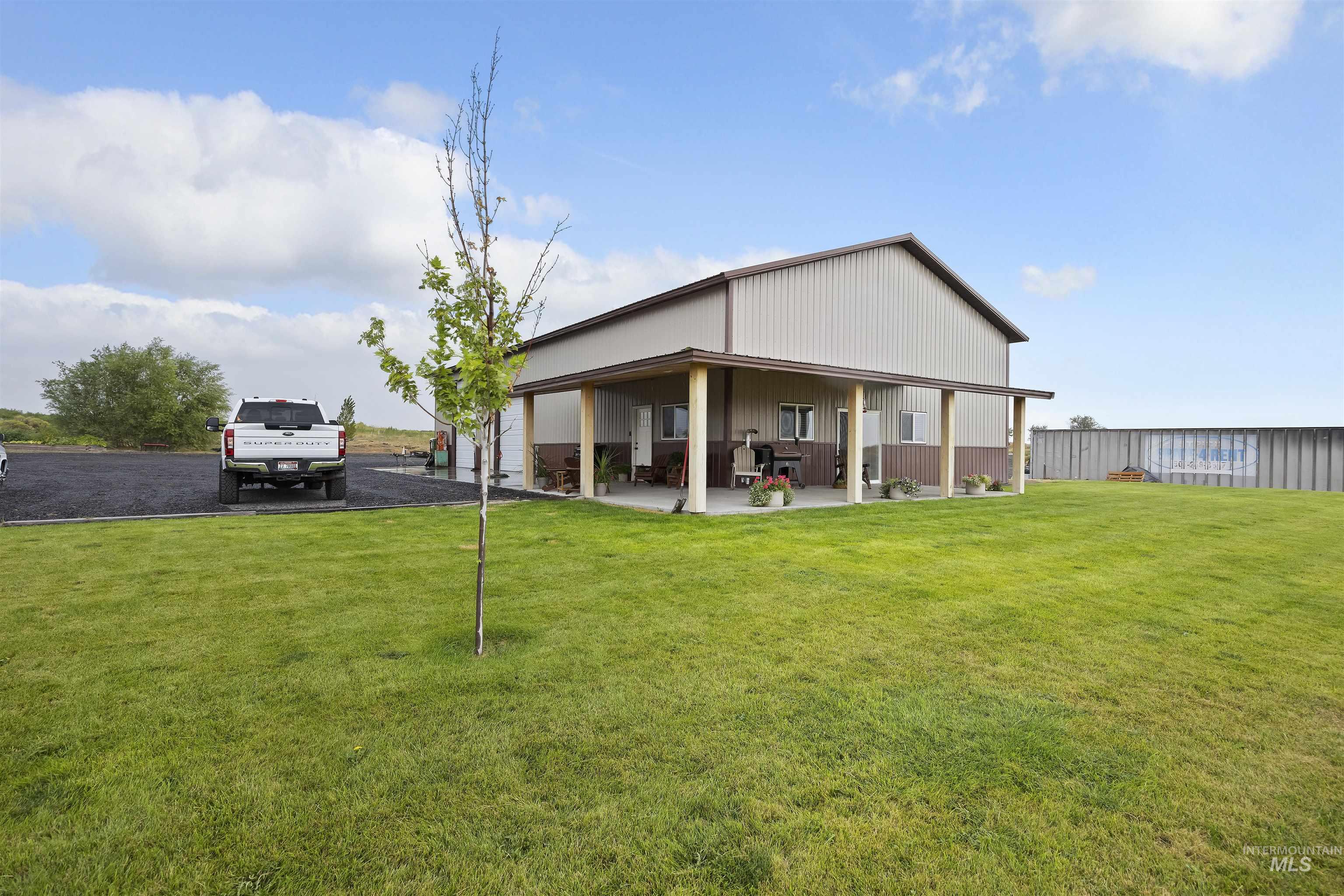 Rear view of property with a patio area