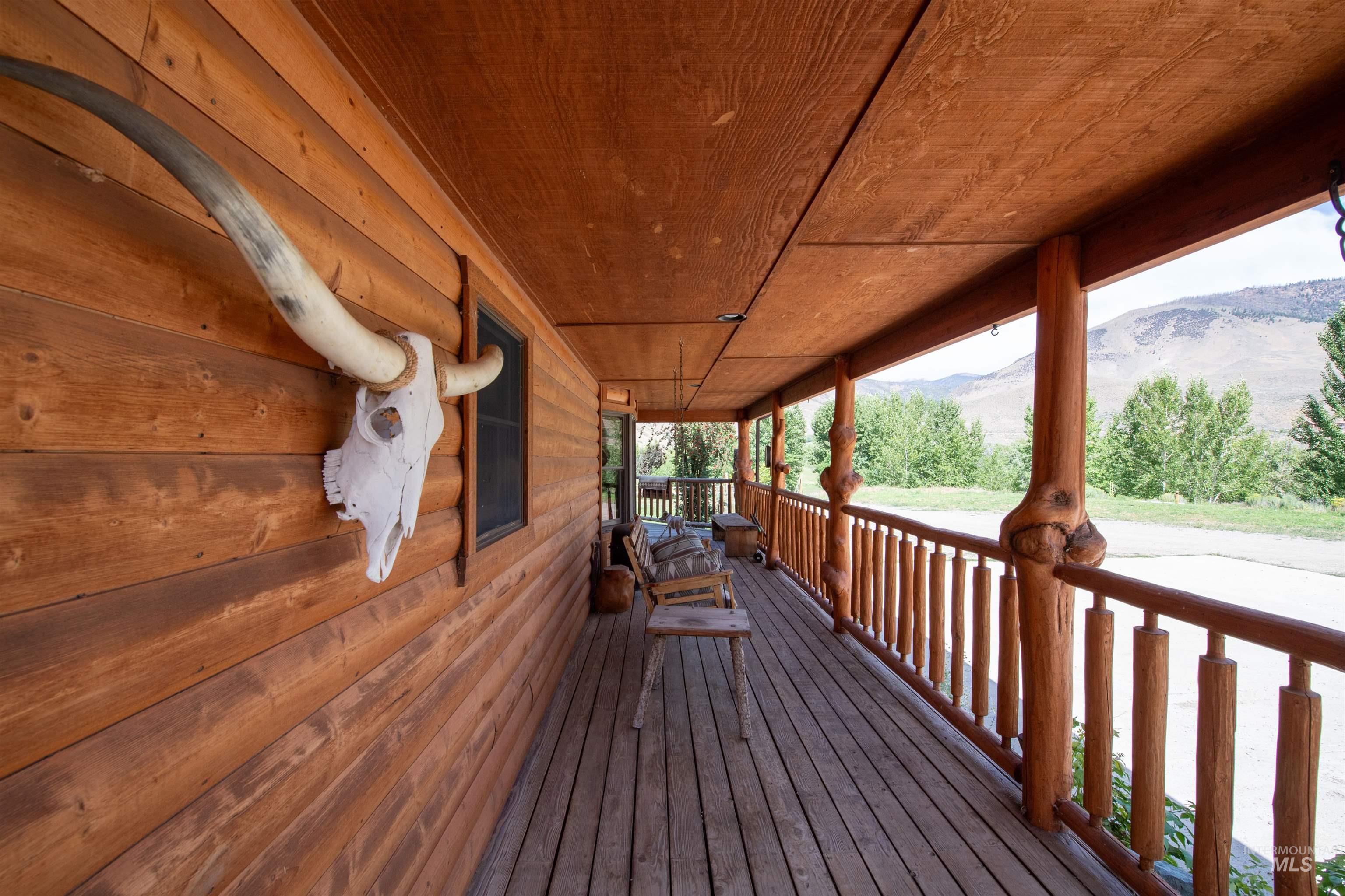 Porch featuring a mountain view