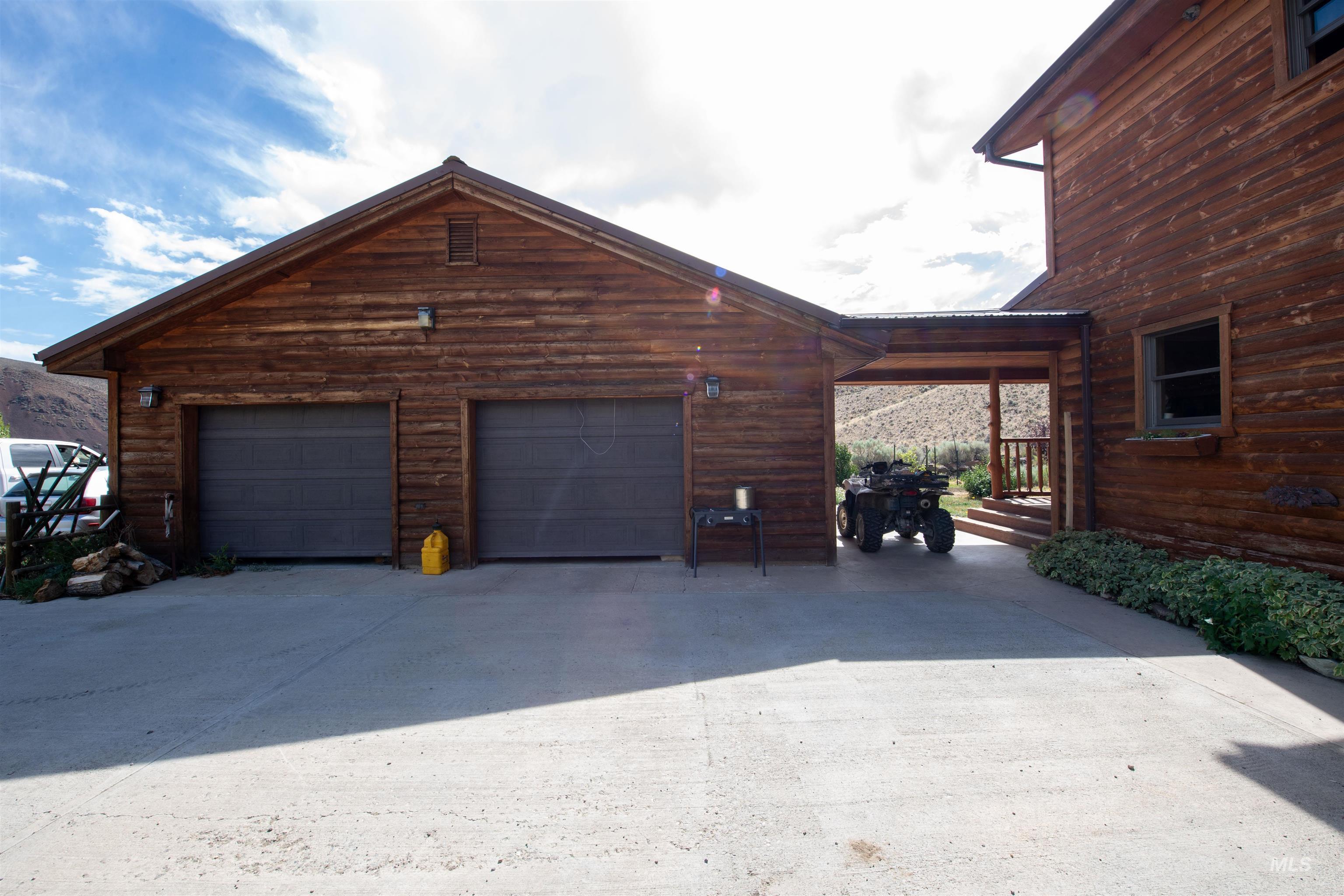 Garage with concrete driveway