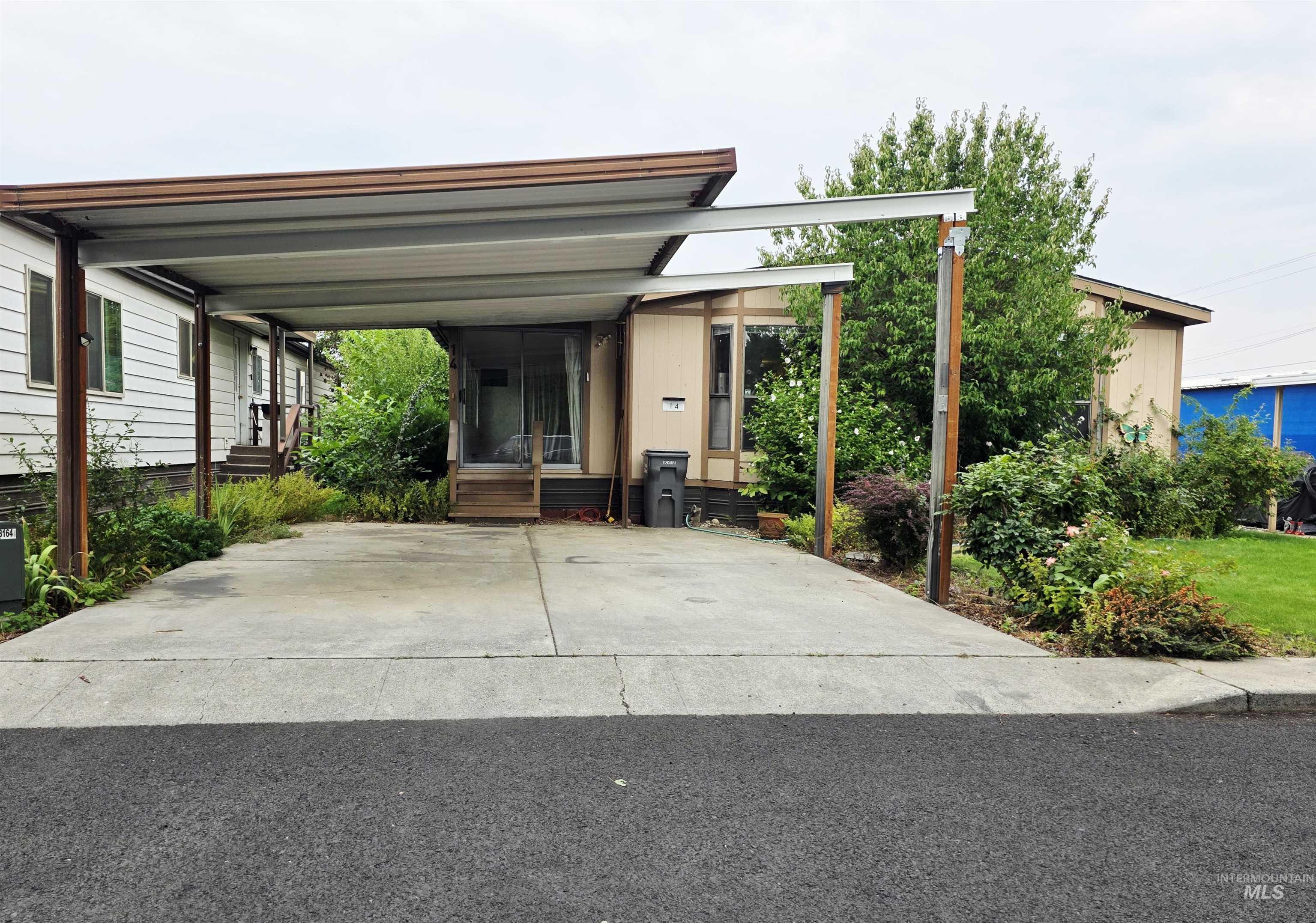 View of car parking with a carport