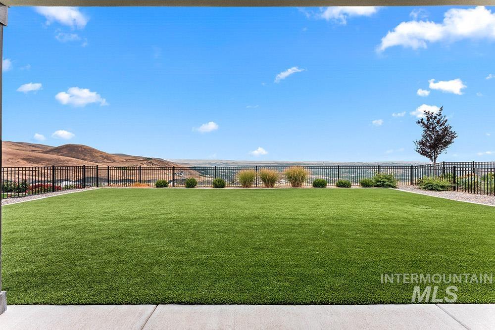 View of yard with a mountain view