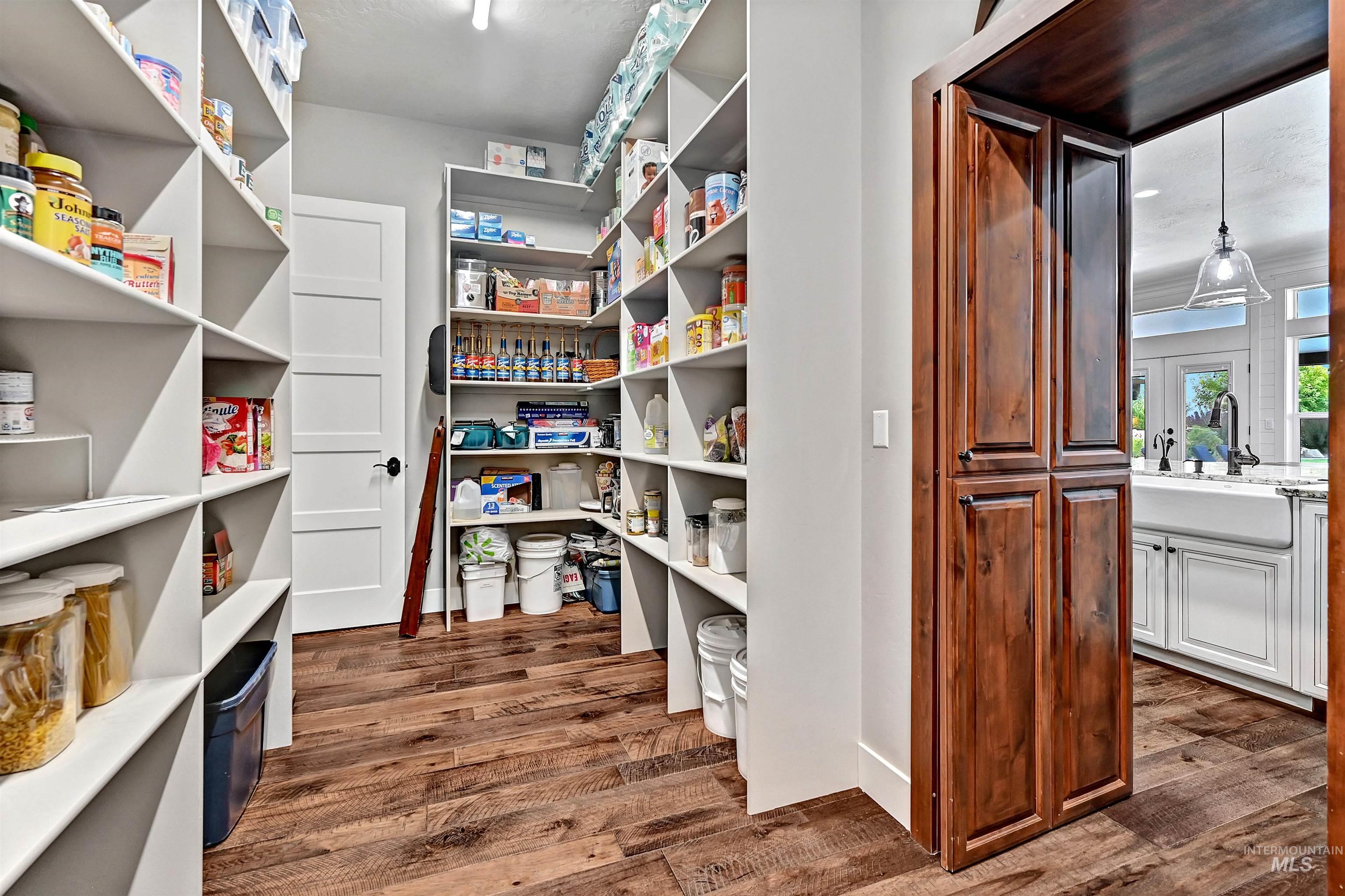 Pantry featuring a sink