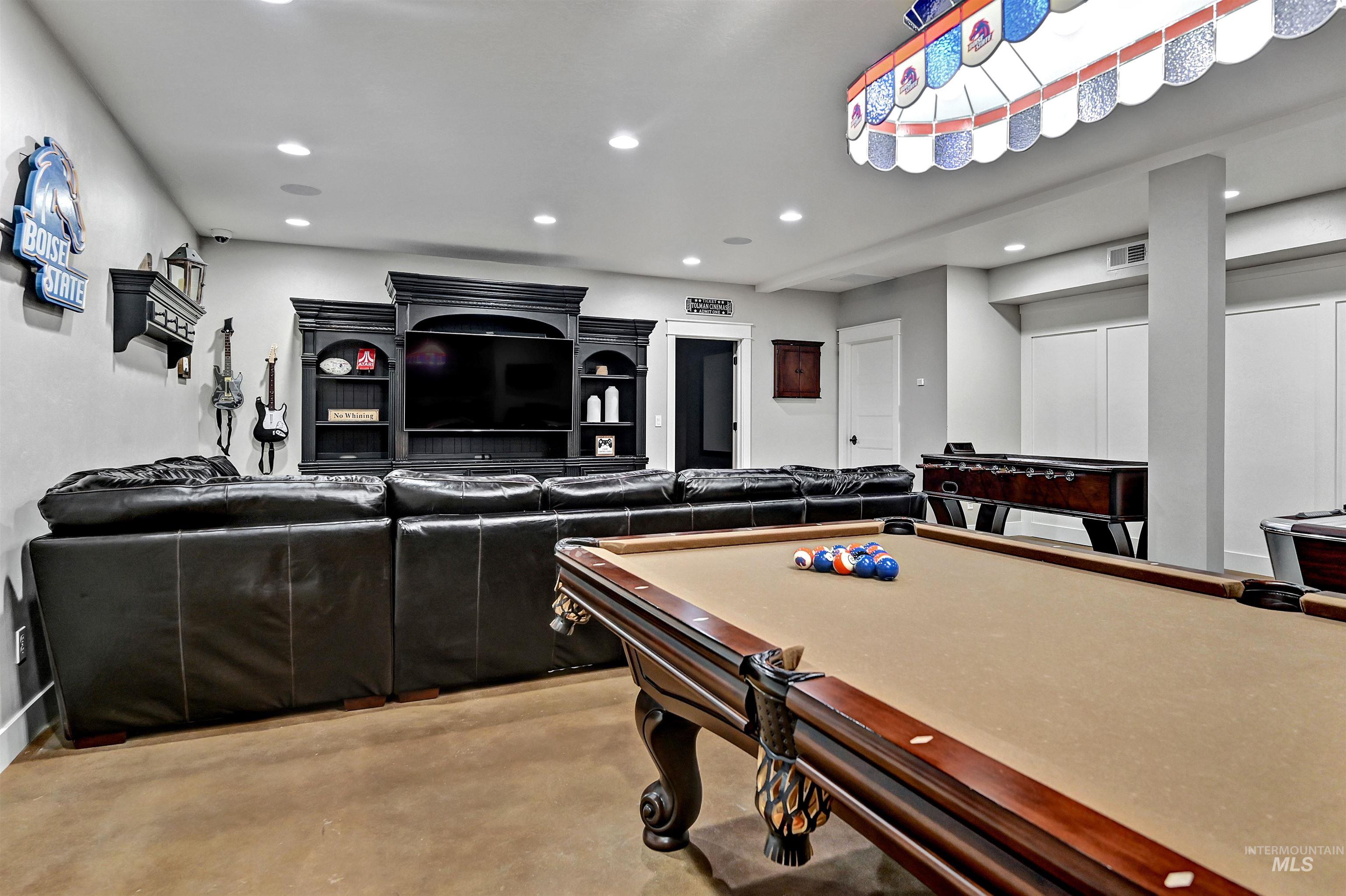 Game room with recessed lighting, concrete flooring, and billiards