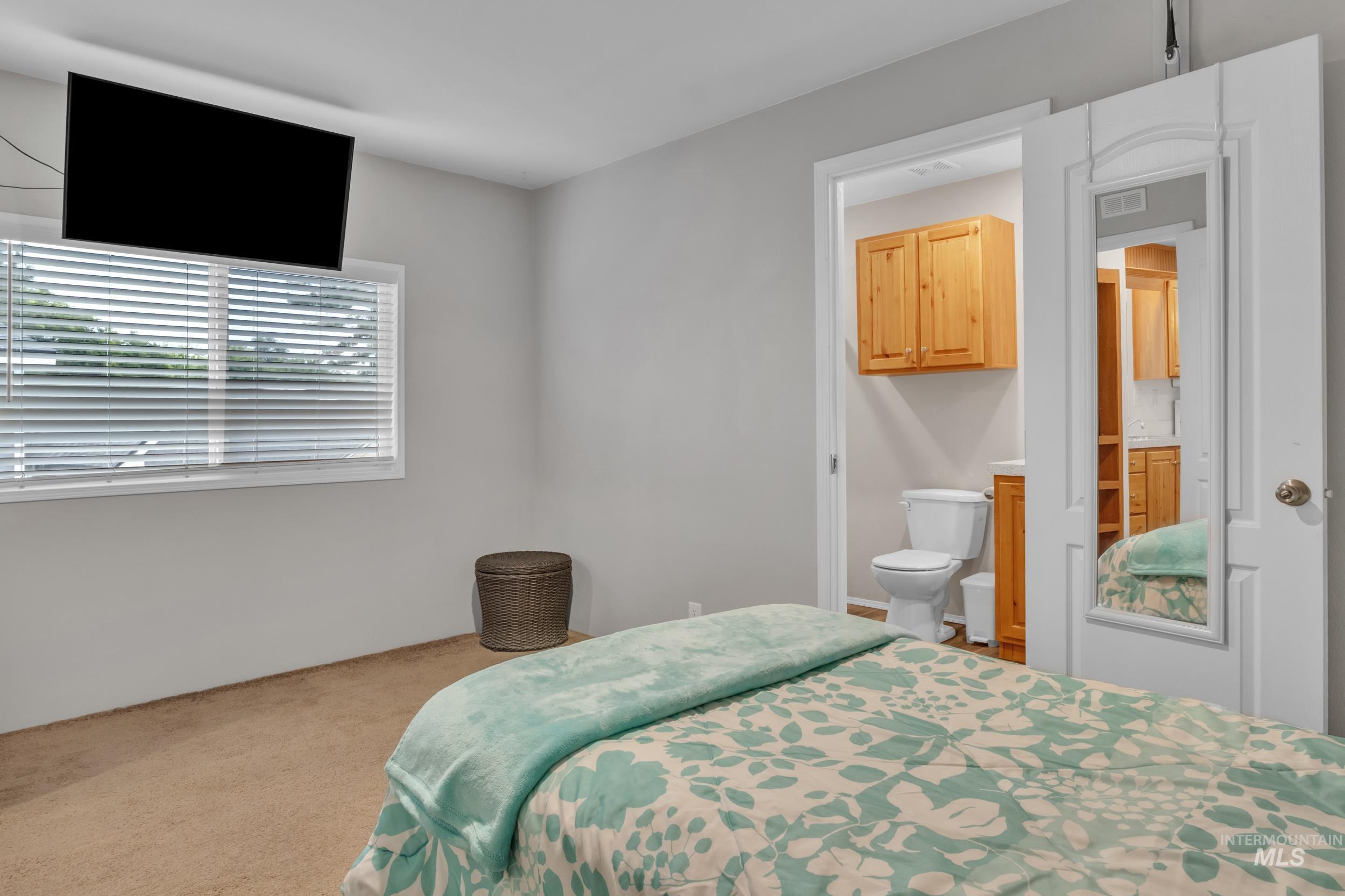 Bedroom with carpet flooring