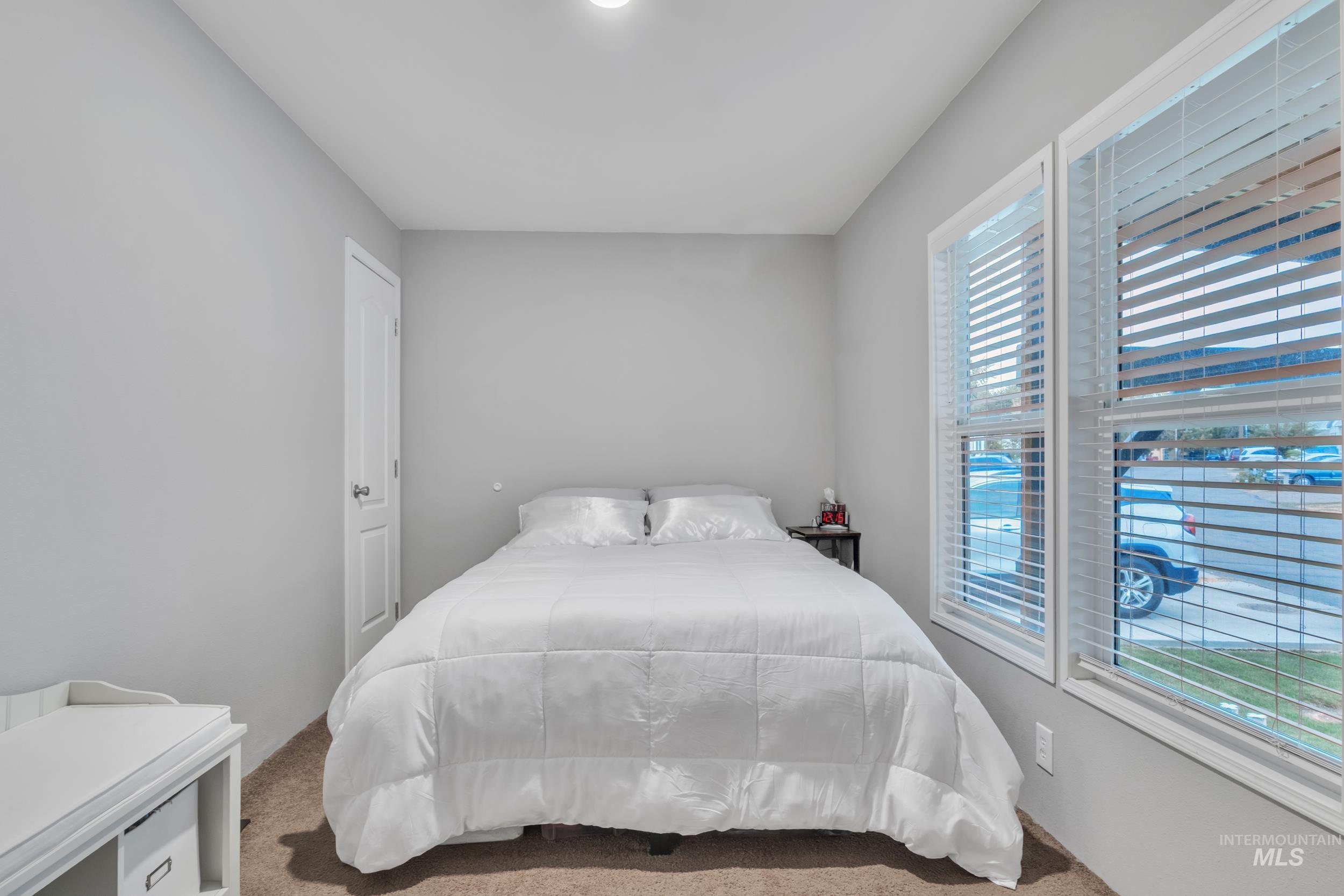 Bedroom featuring carpet floors
