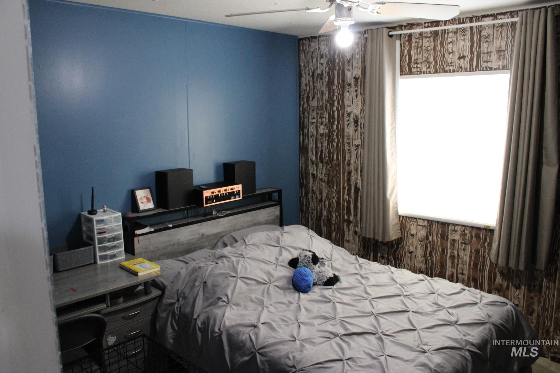 Bedroom with a ceiling fan