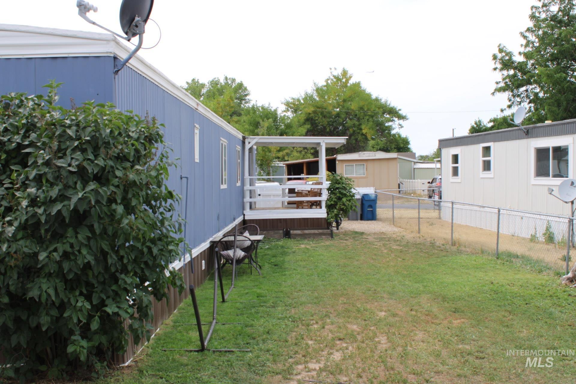 View of yard featuring a wooden deck