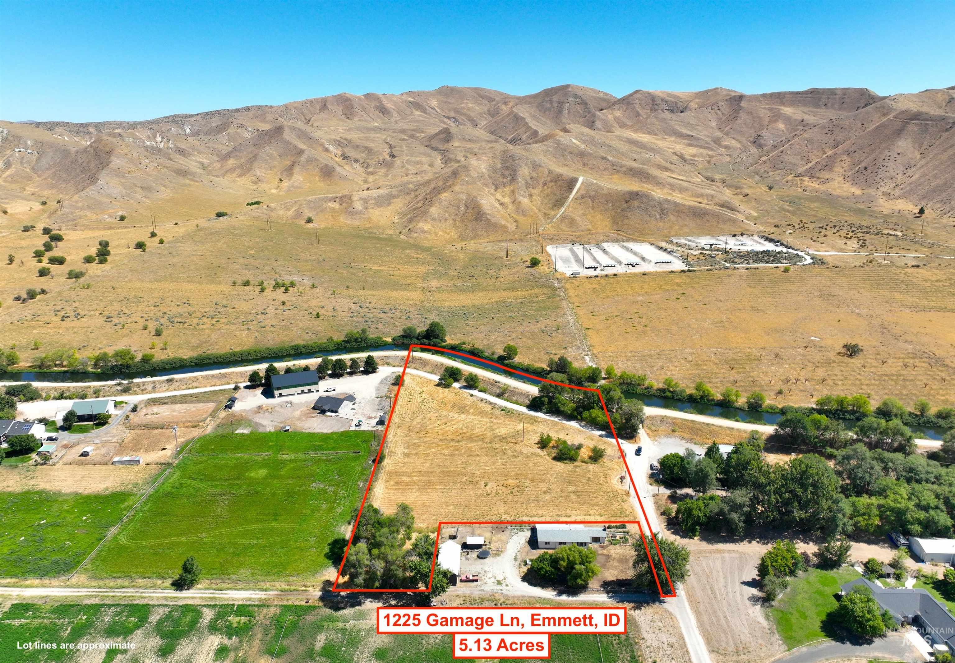 View of rural area with mountains and property parcel outlined