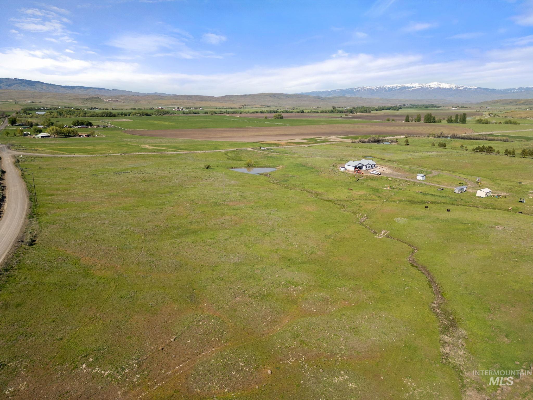 View of rural area with a mountain backdrop