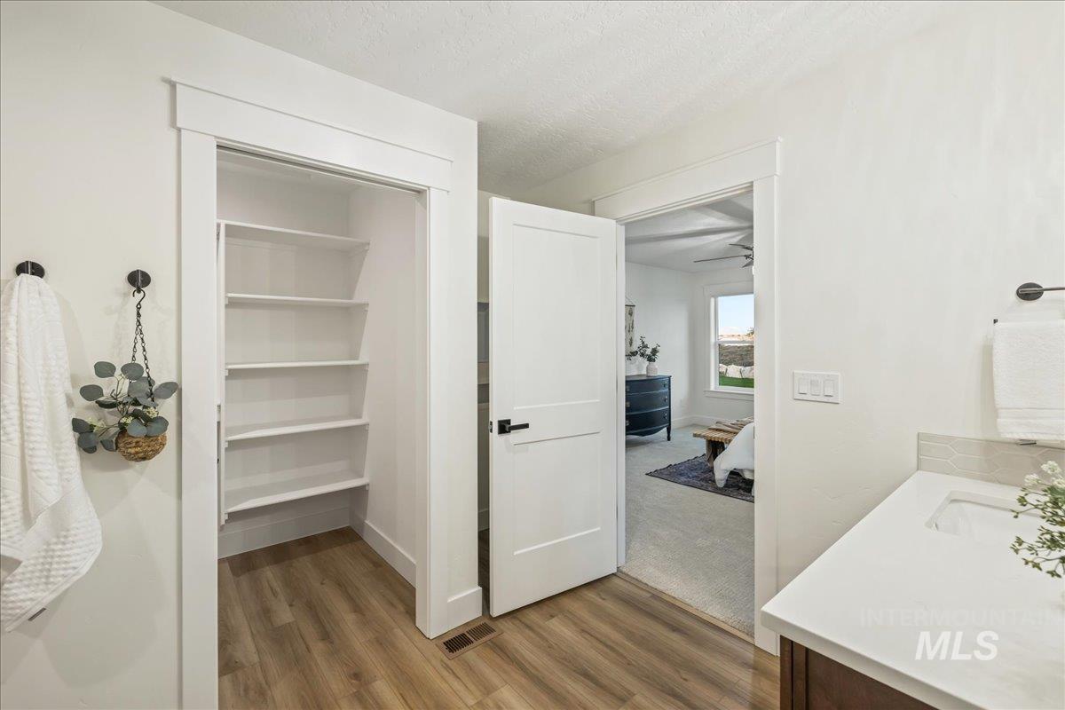 Storage area featuring a sink