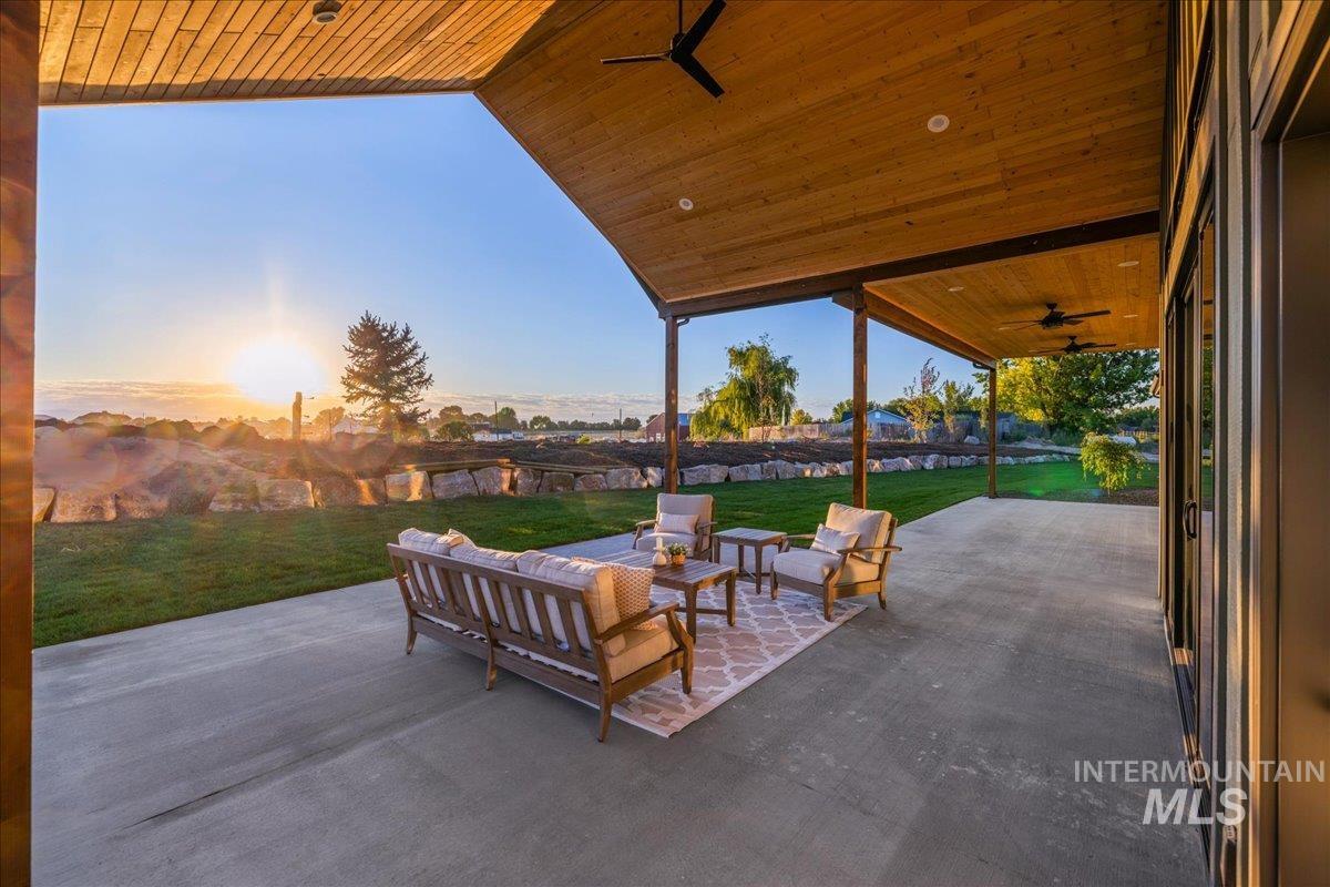 View of patio / terrace featuring ceiling fan