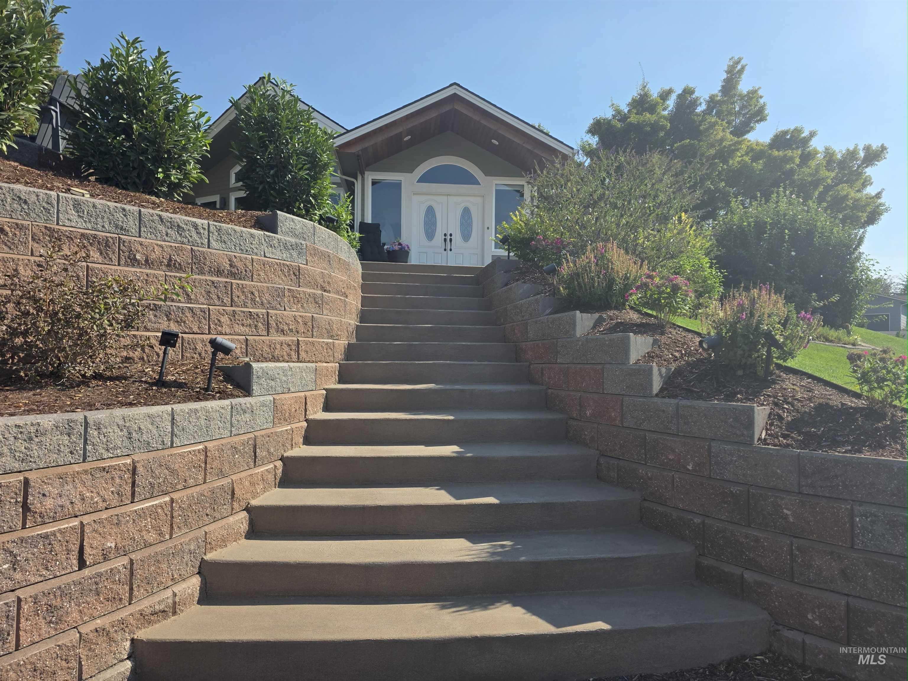 View of front facade with stairs
