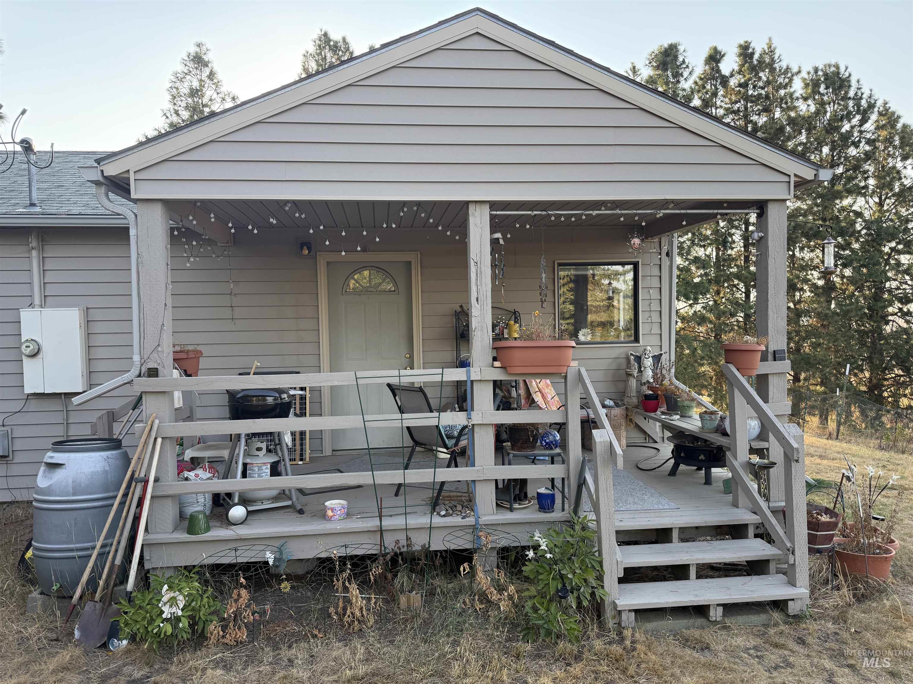 Back of house featuring a deck