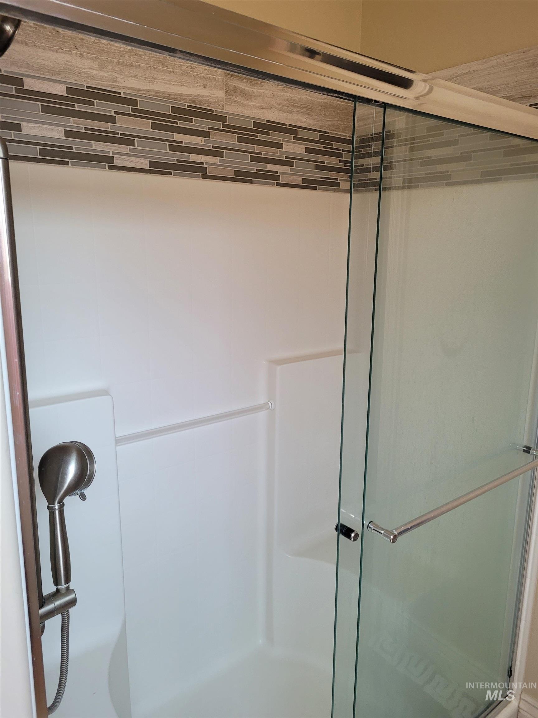 Bathroom featuring a stall shower