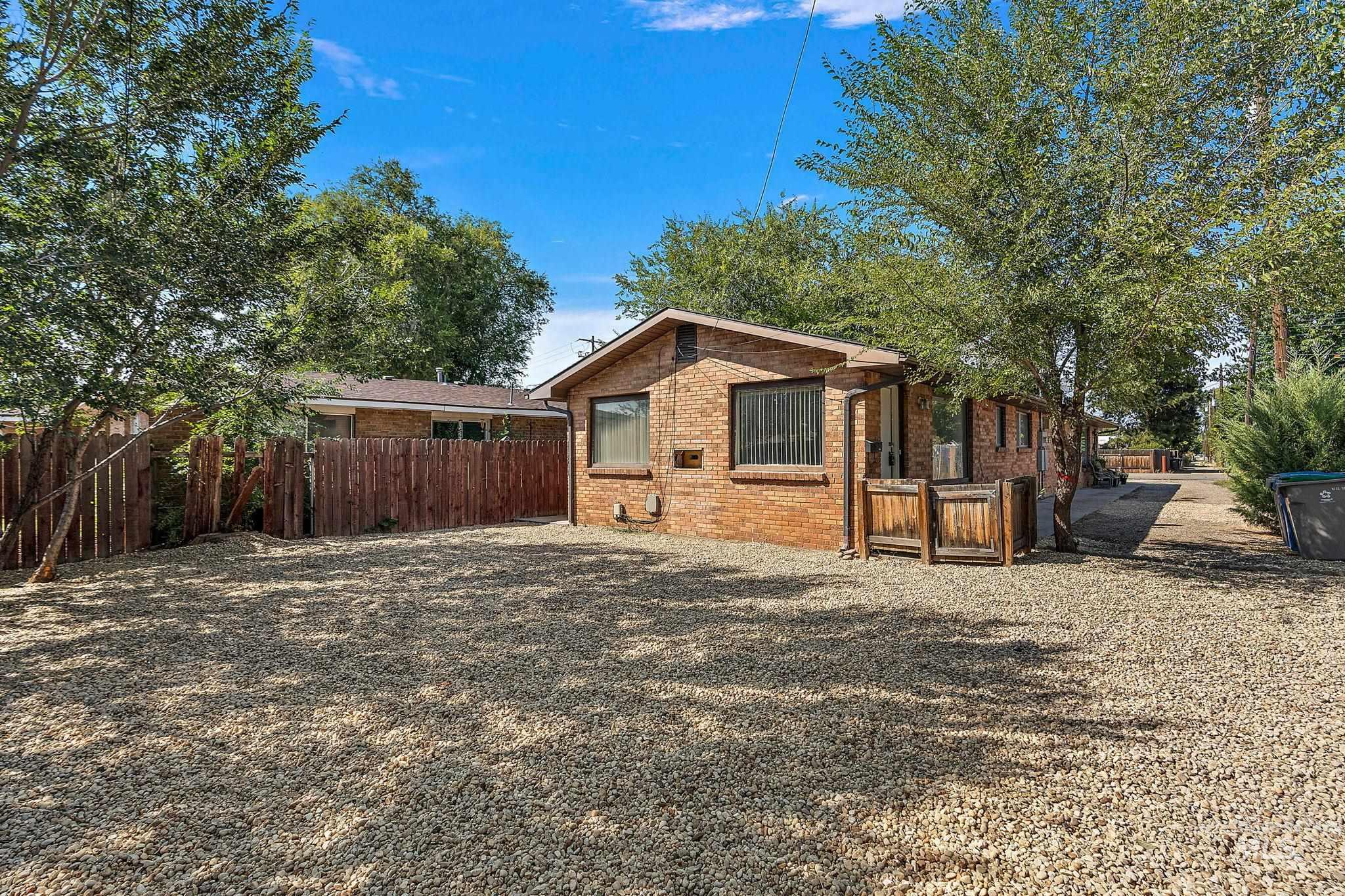 View of side of property featuring brick siding