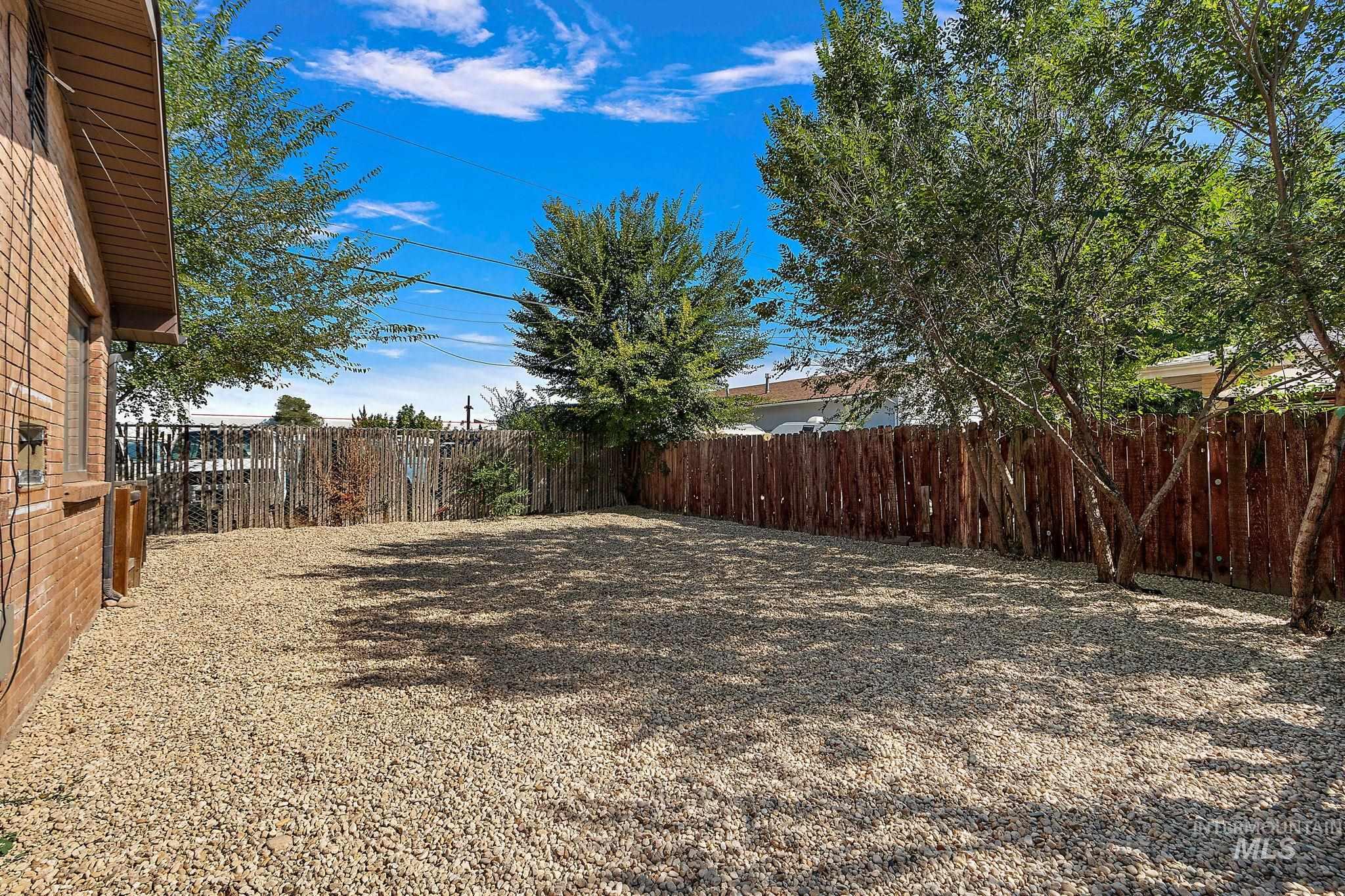 View of fenced backyard