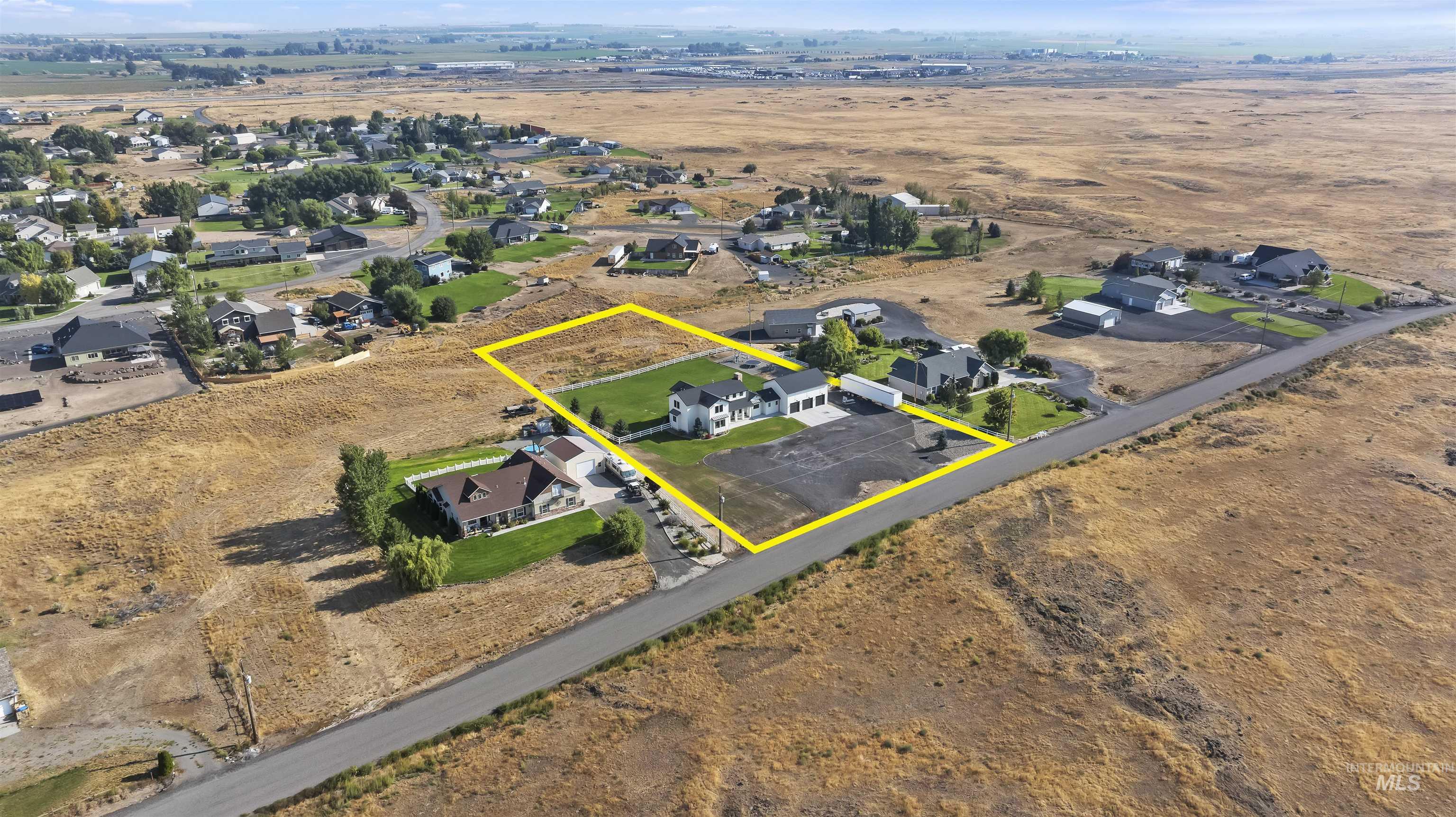 Aerial perspective of suburban area with property boundaries highlighted