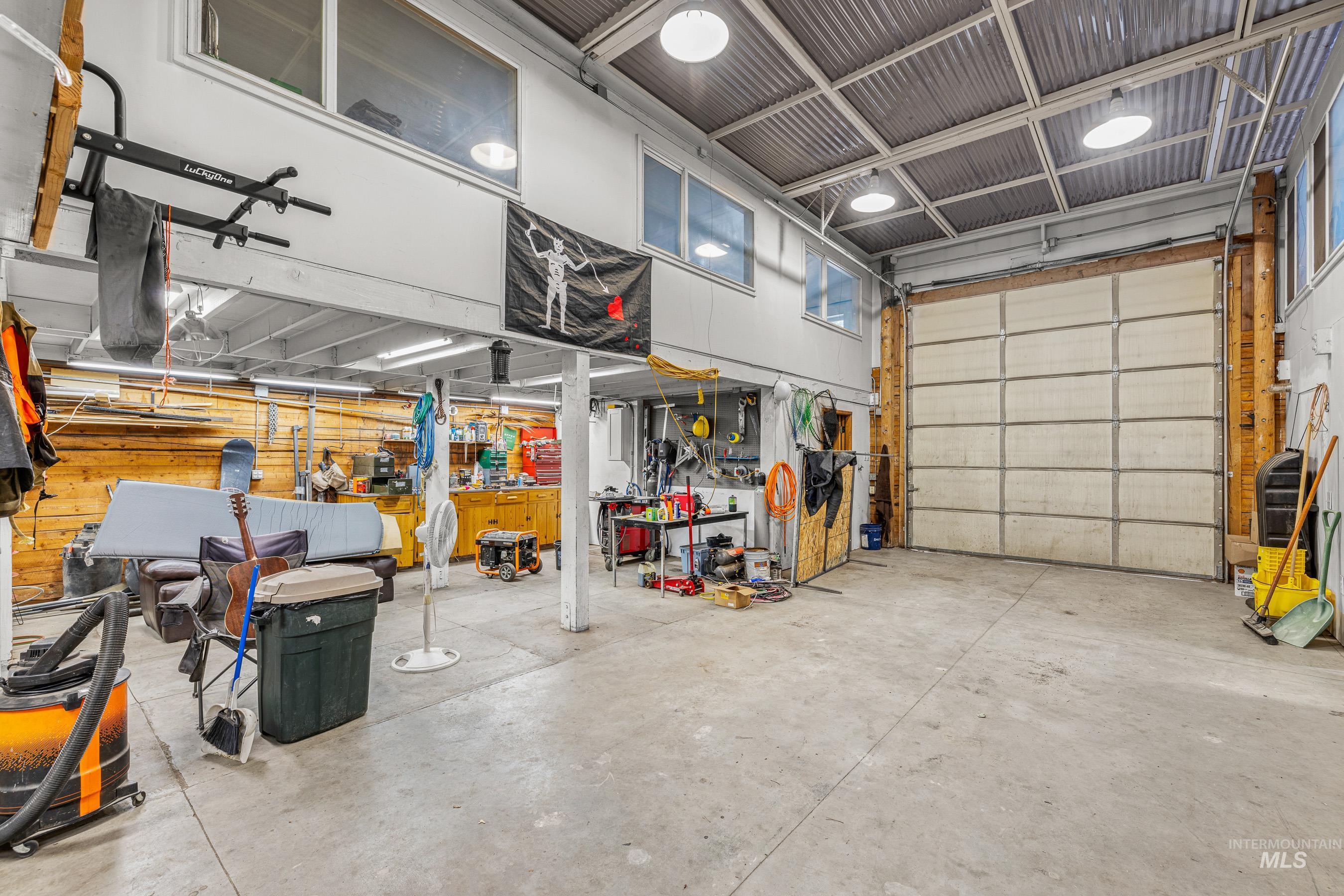Garage featuring a workshop area