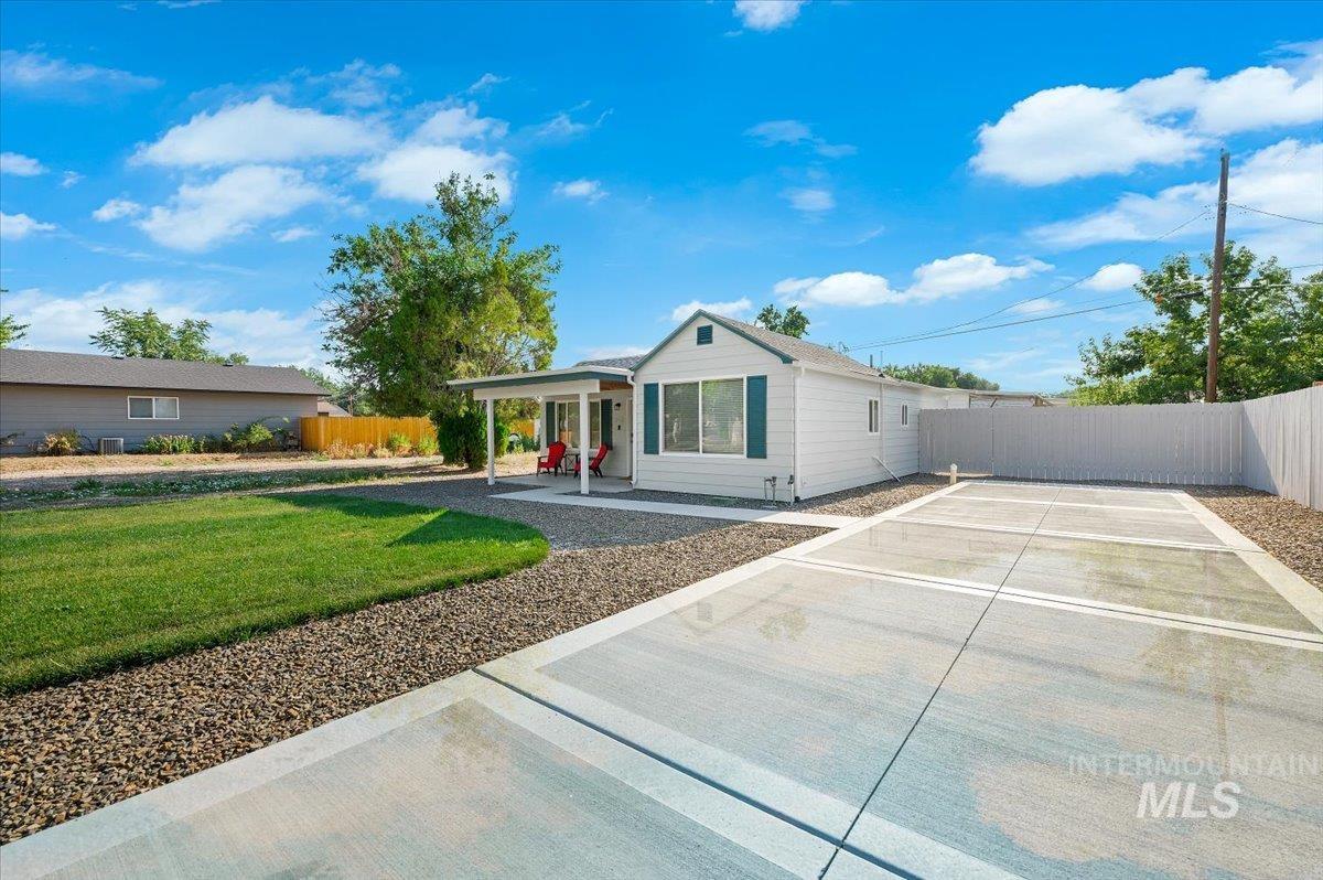 Ranch-style house with a patio area