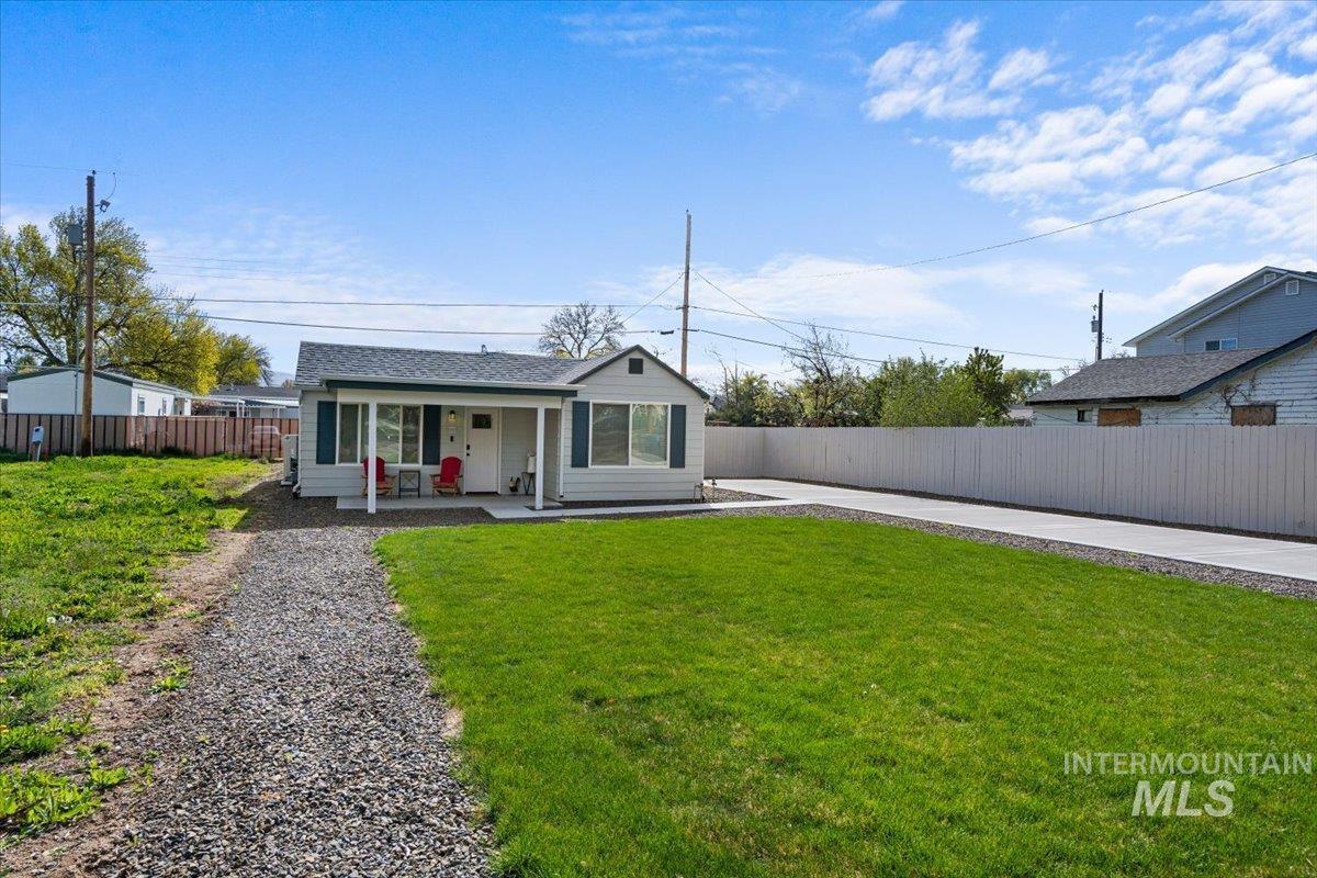 Back of property featuring a patio area
