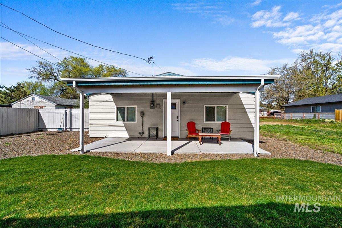 Back of house with a patio area
