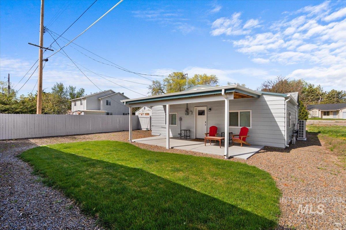 Rear view of house featuring a patio area