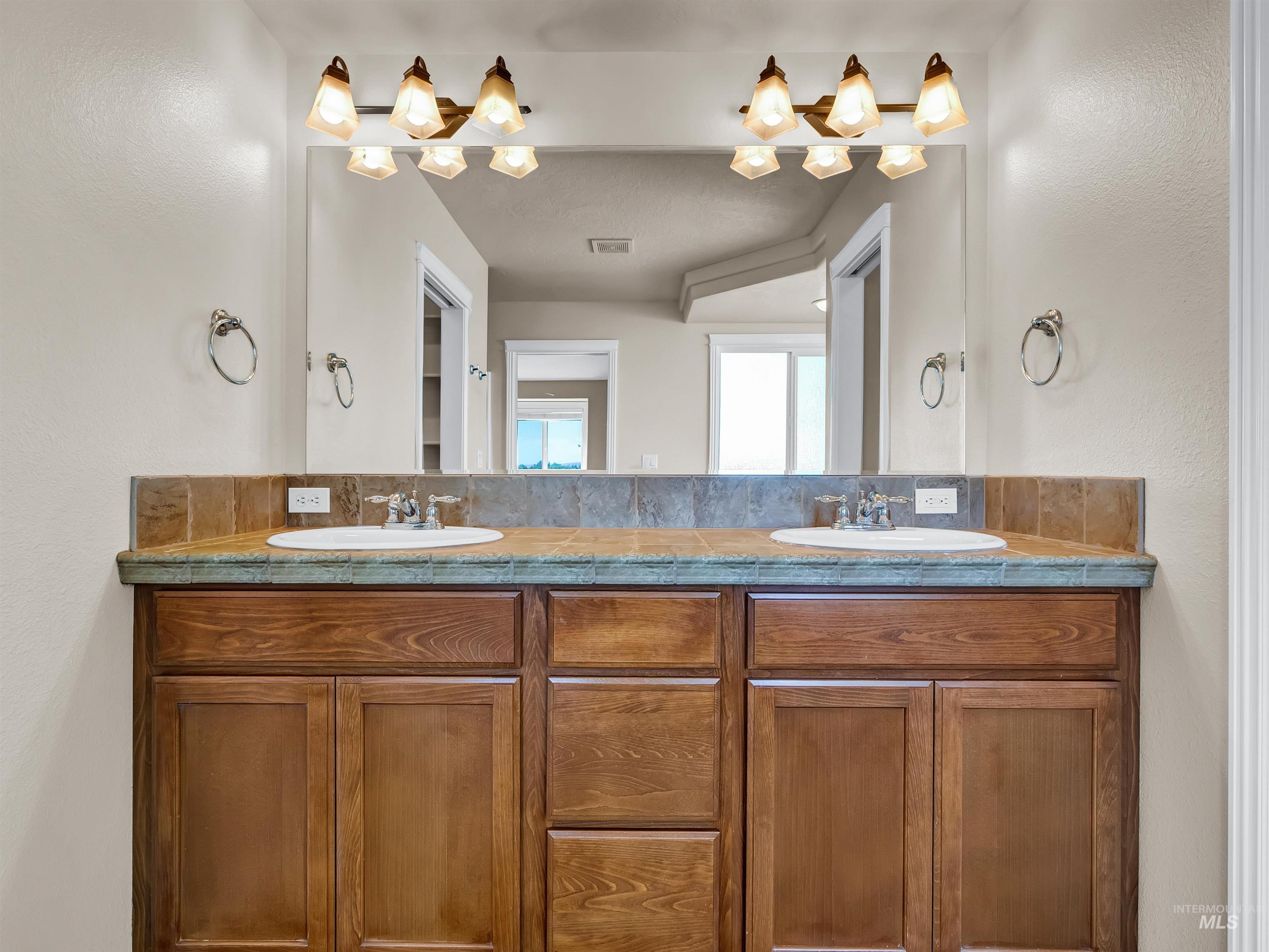 9303 W Stirrup Drive, Boise, Idaho 83709, 4 Bedrooms, 2.5 Bathrooms, Residential For Sale, Price $594,900, 98960066