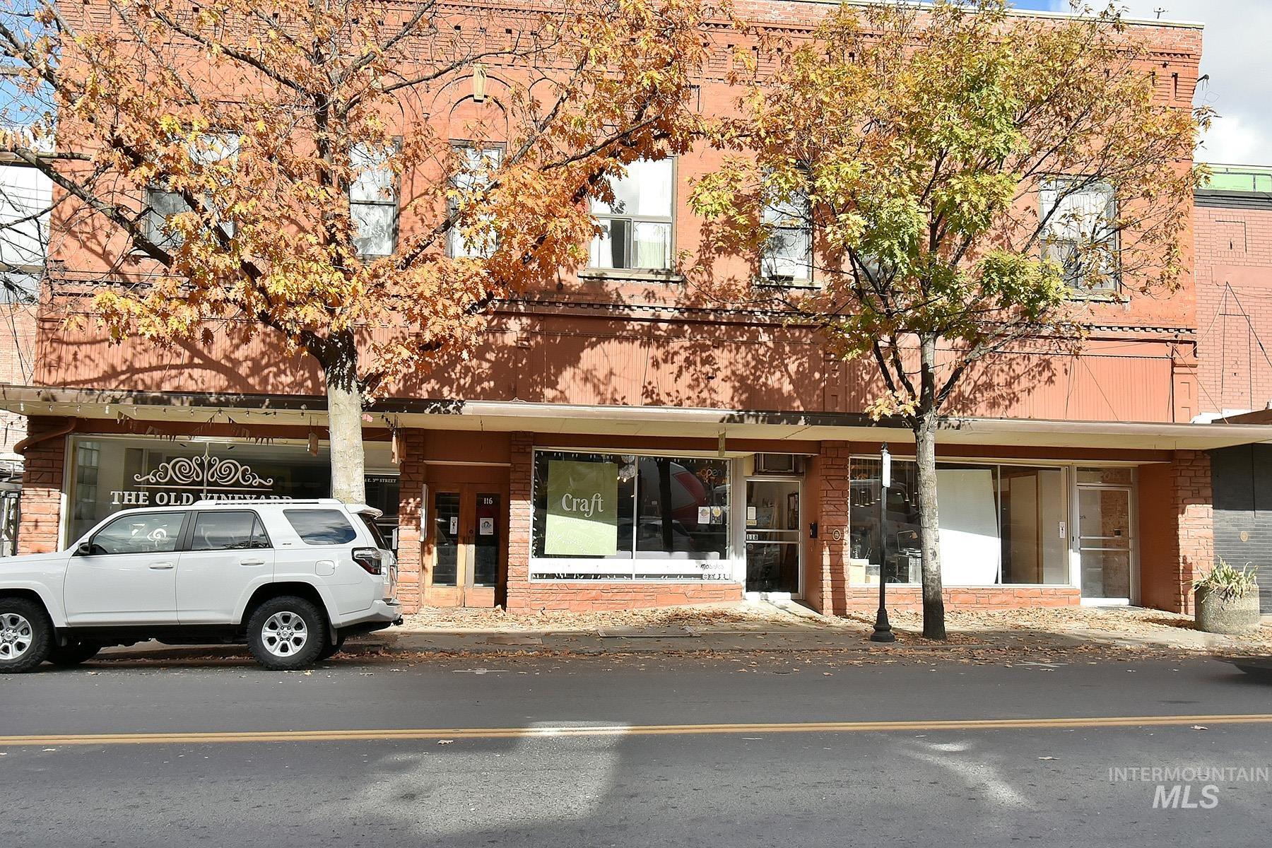 View of front of property with brick siding