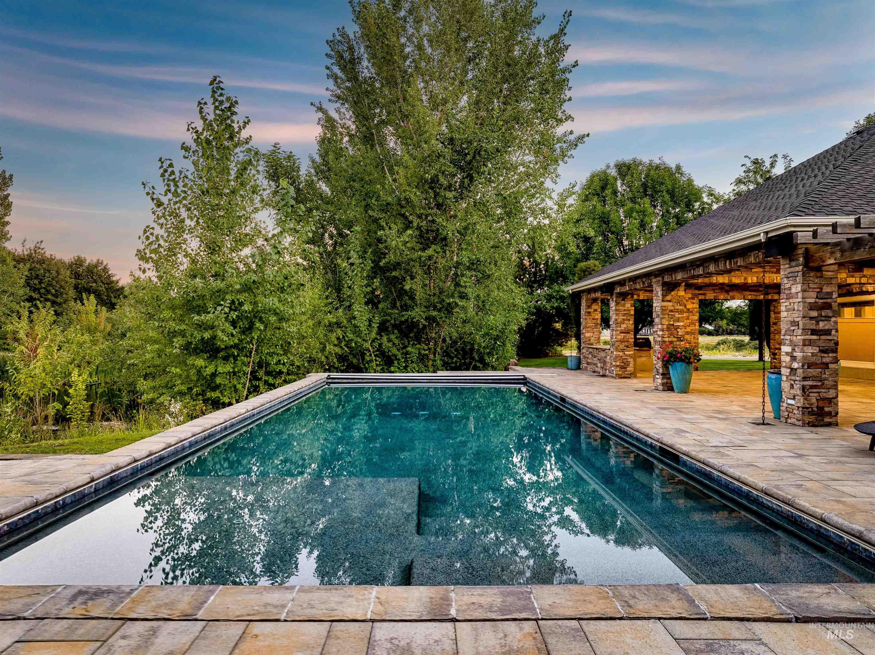 Outdoor pool with a patio area