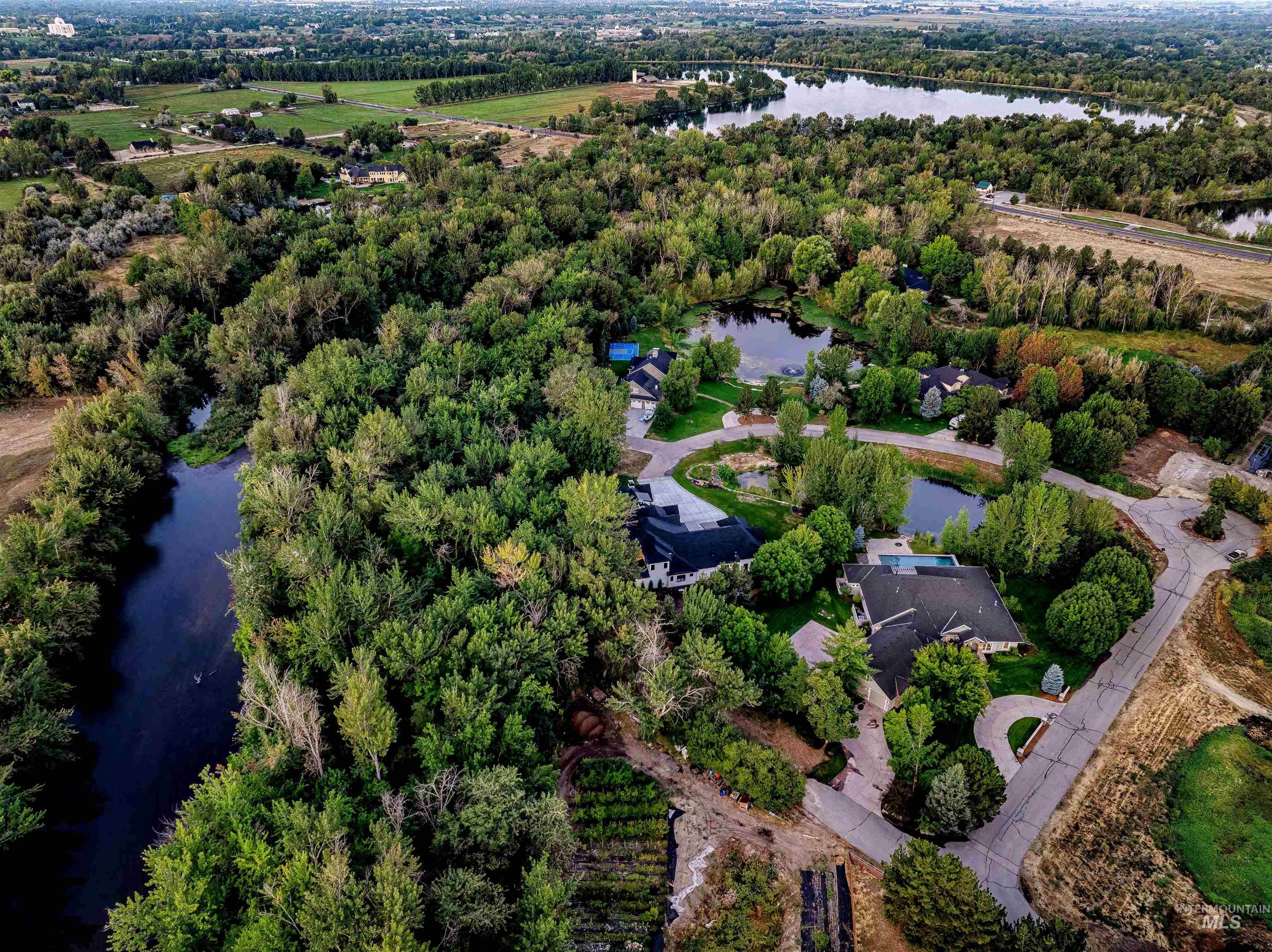 View of property location with a large body of water